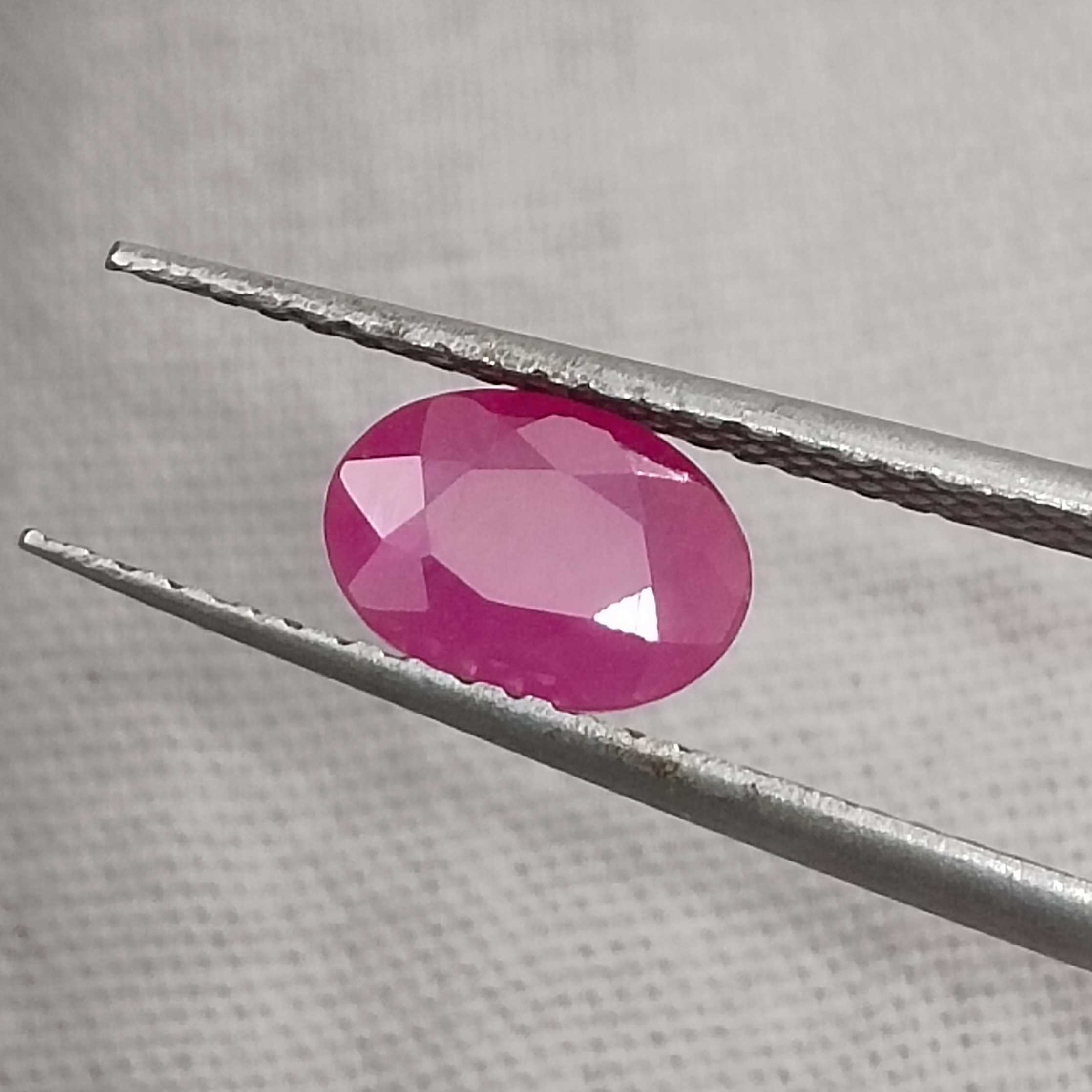1.00ct certified pinkish red oval cut unheated ruby 