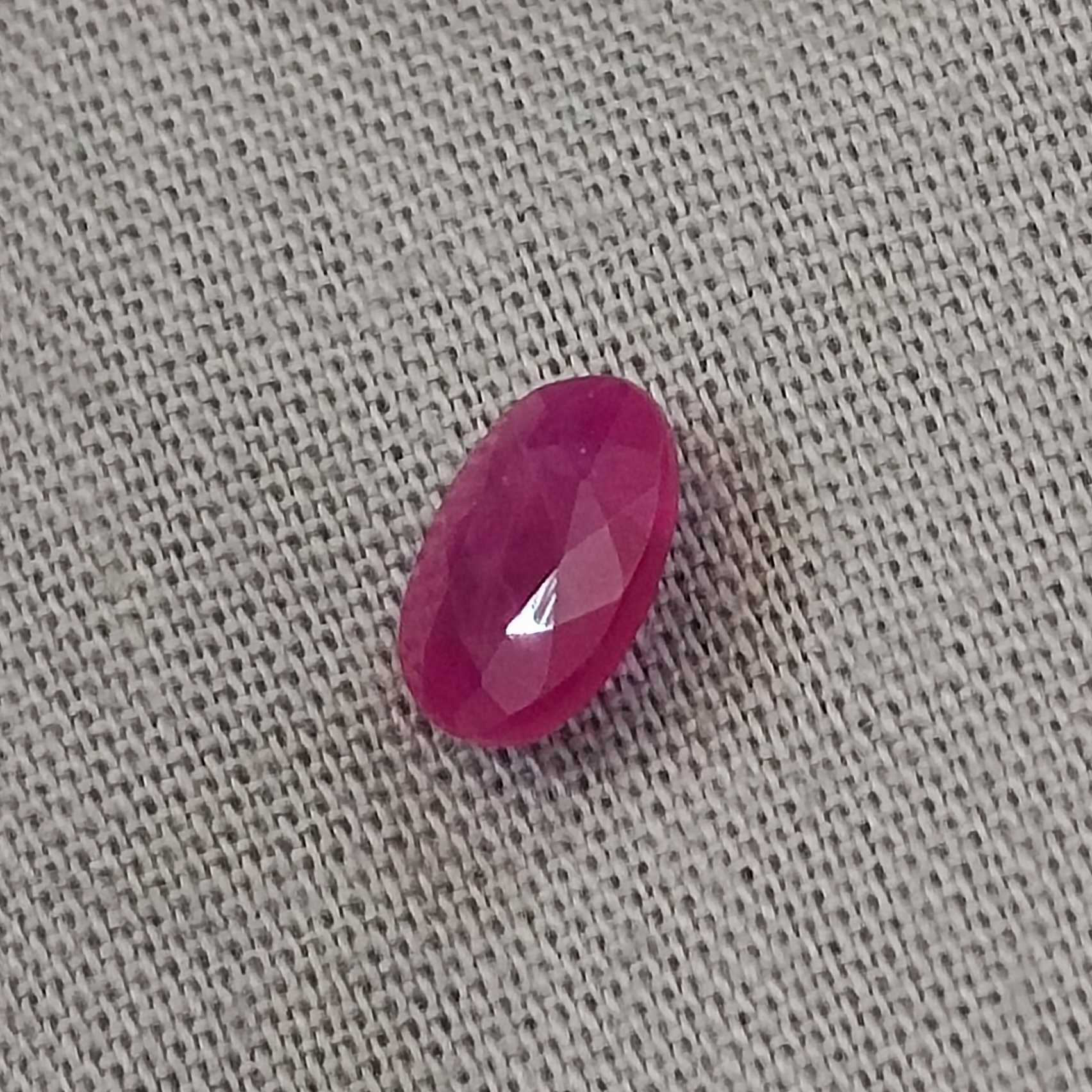 1.00ct certified pinkish red oval cut unheated ruby 