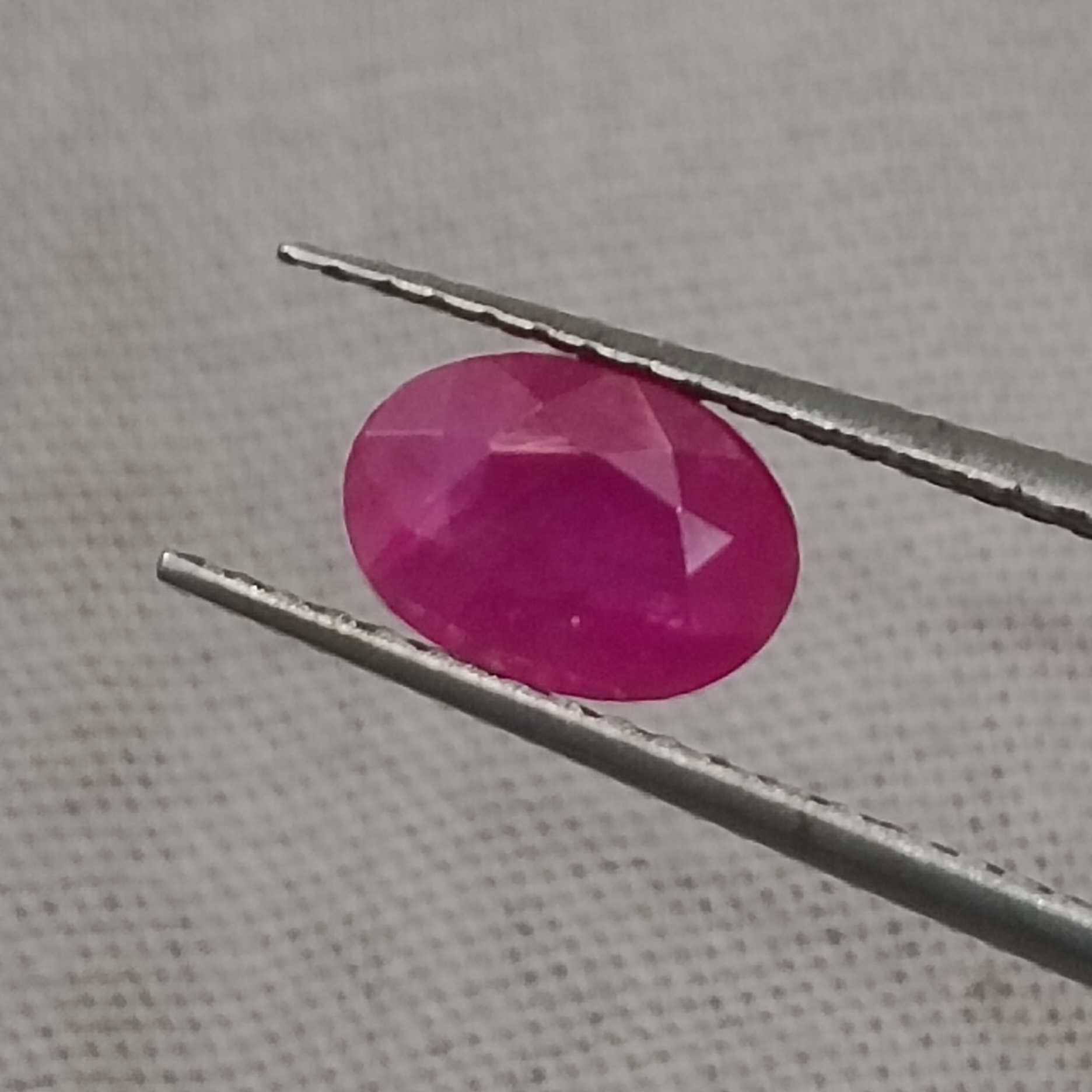 1.00ct certified pinkish red oval cut unheated ruby 