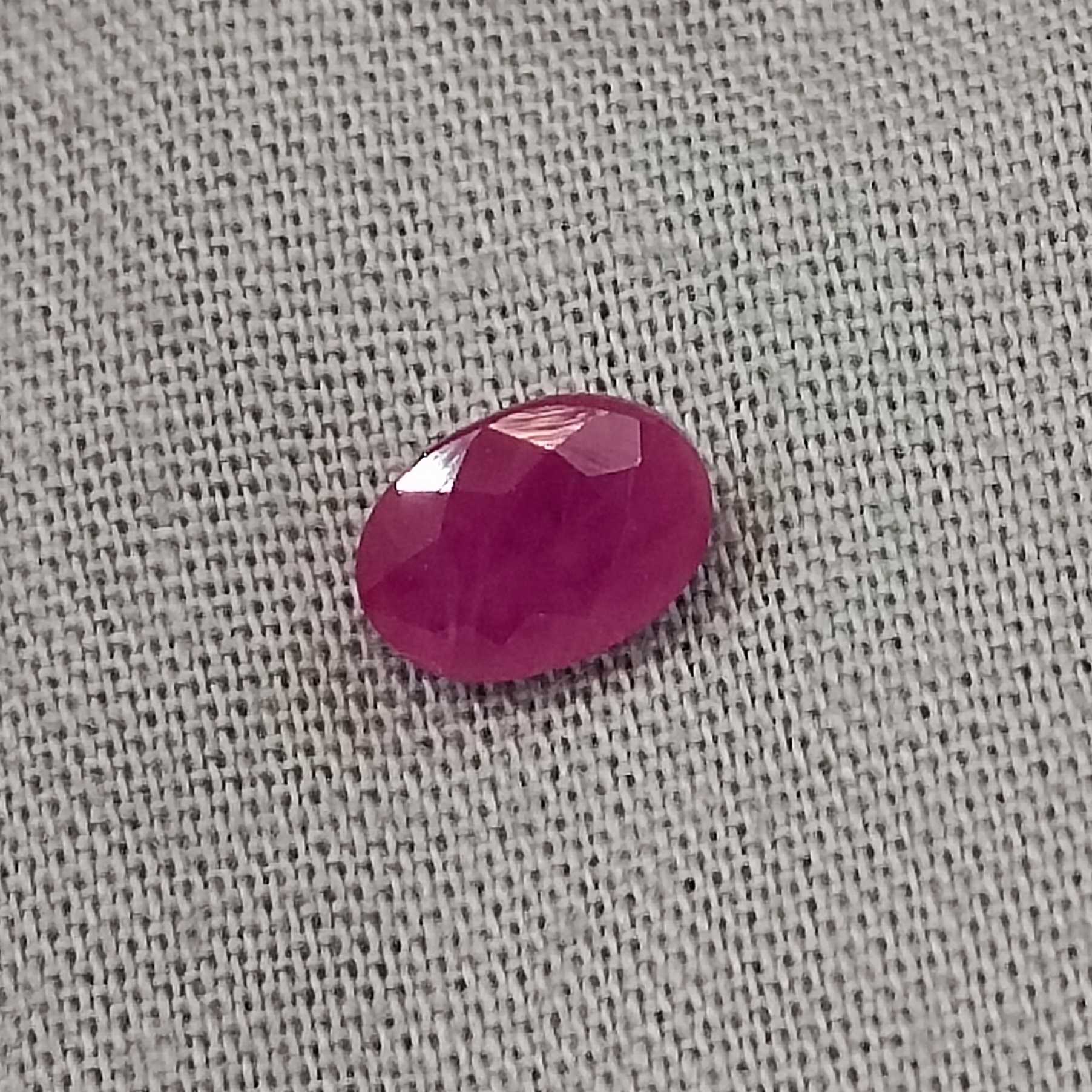 1.00ct certified pinkish red oval cut unheated ruby 