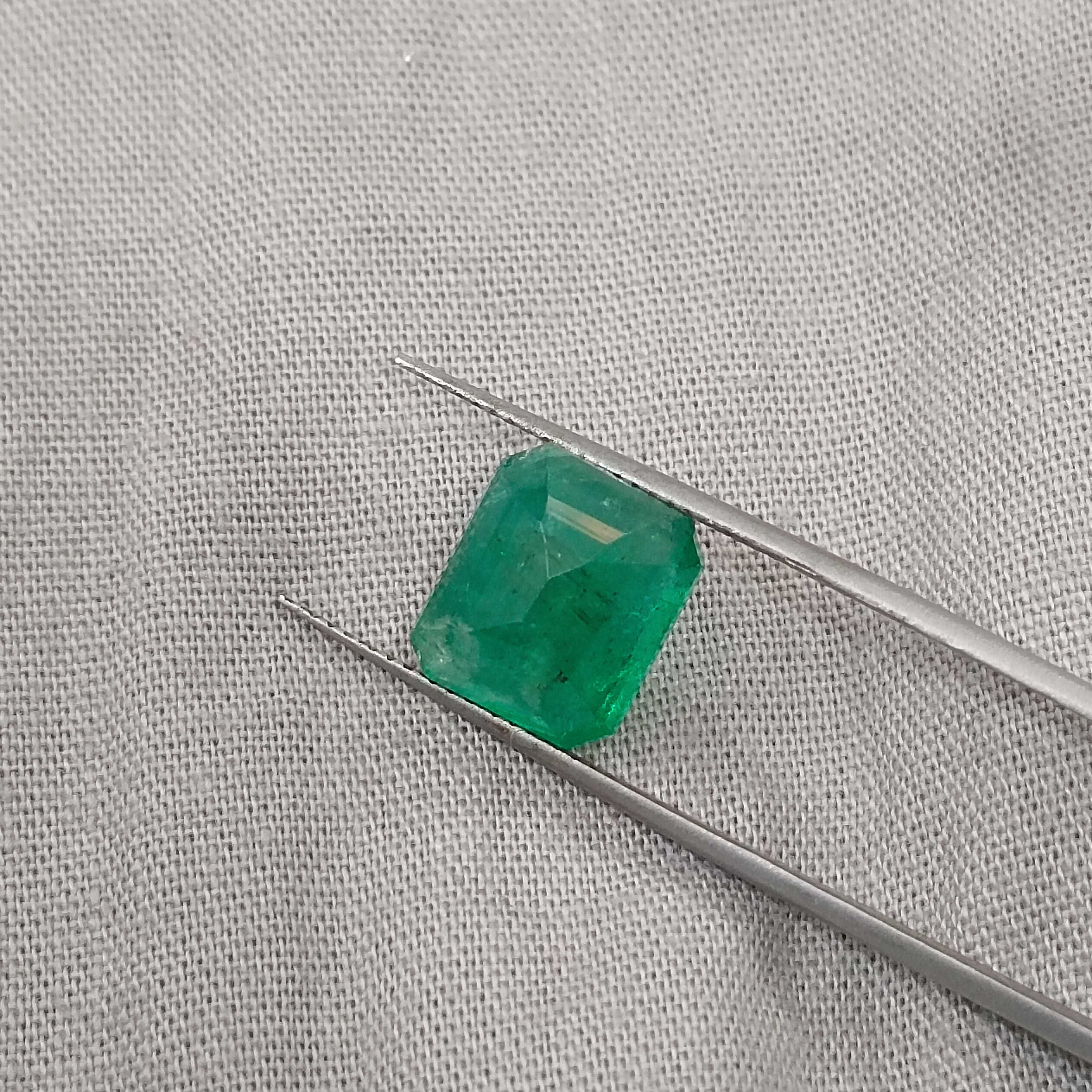 4.64cts certified pure medium green octagon cut emerald gem