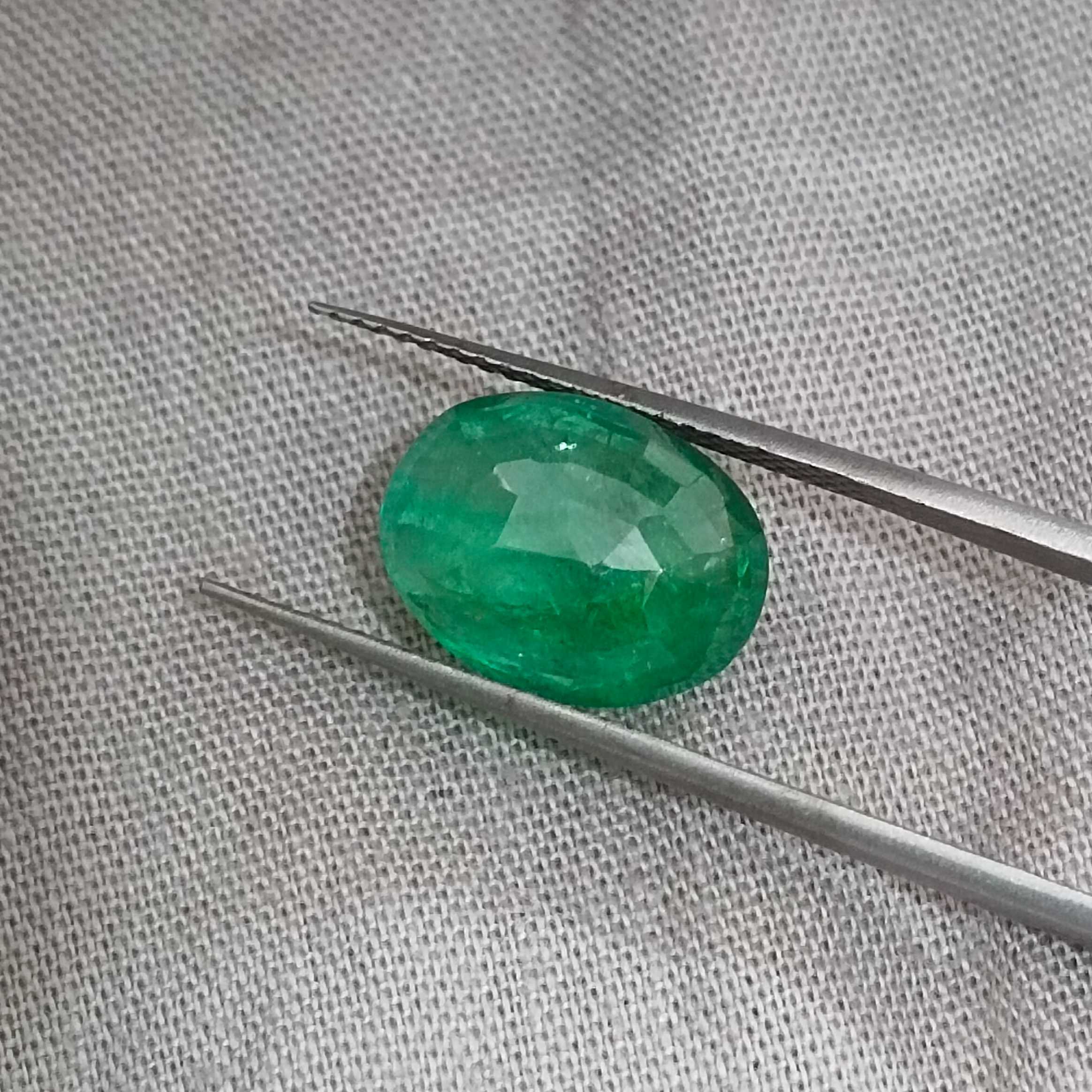 4.13ct certified natural spring green oval mix cut Swat emerald R