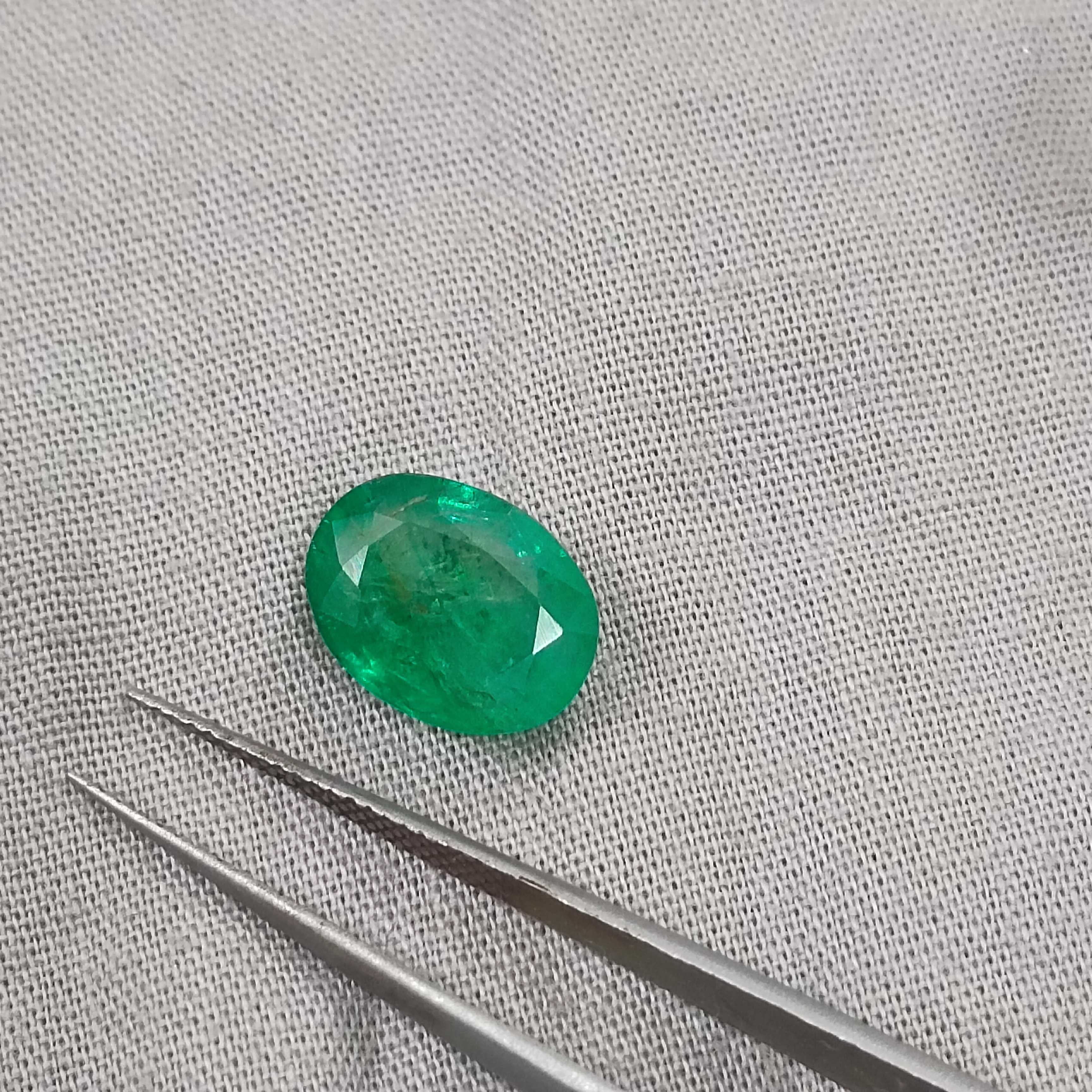 4.13ct certified natural spring green oval mix cut Swat emerald R