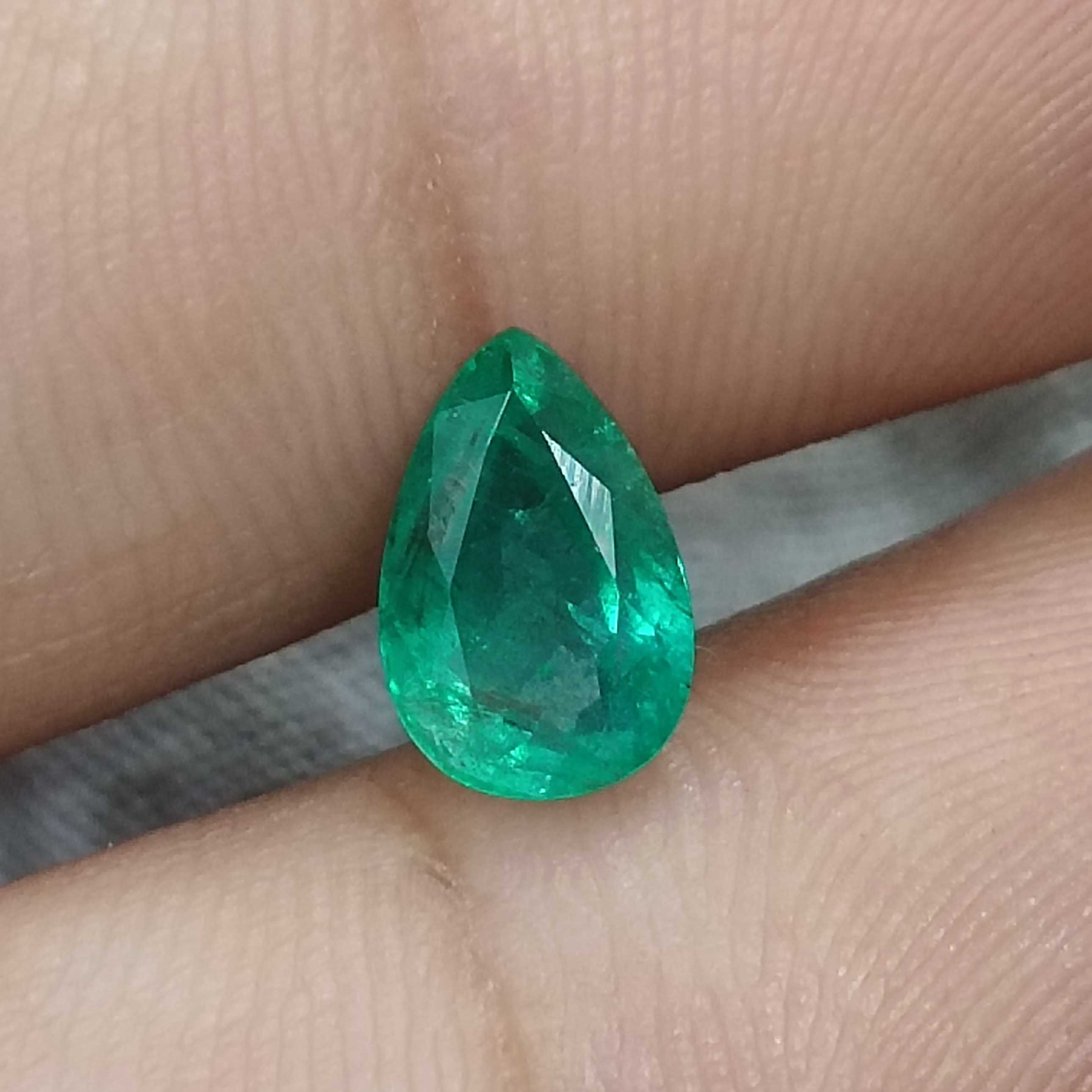 1.51cts natural golden green colour pear shaped Zambian emerald 