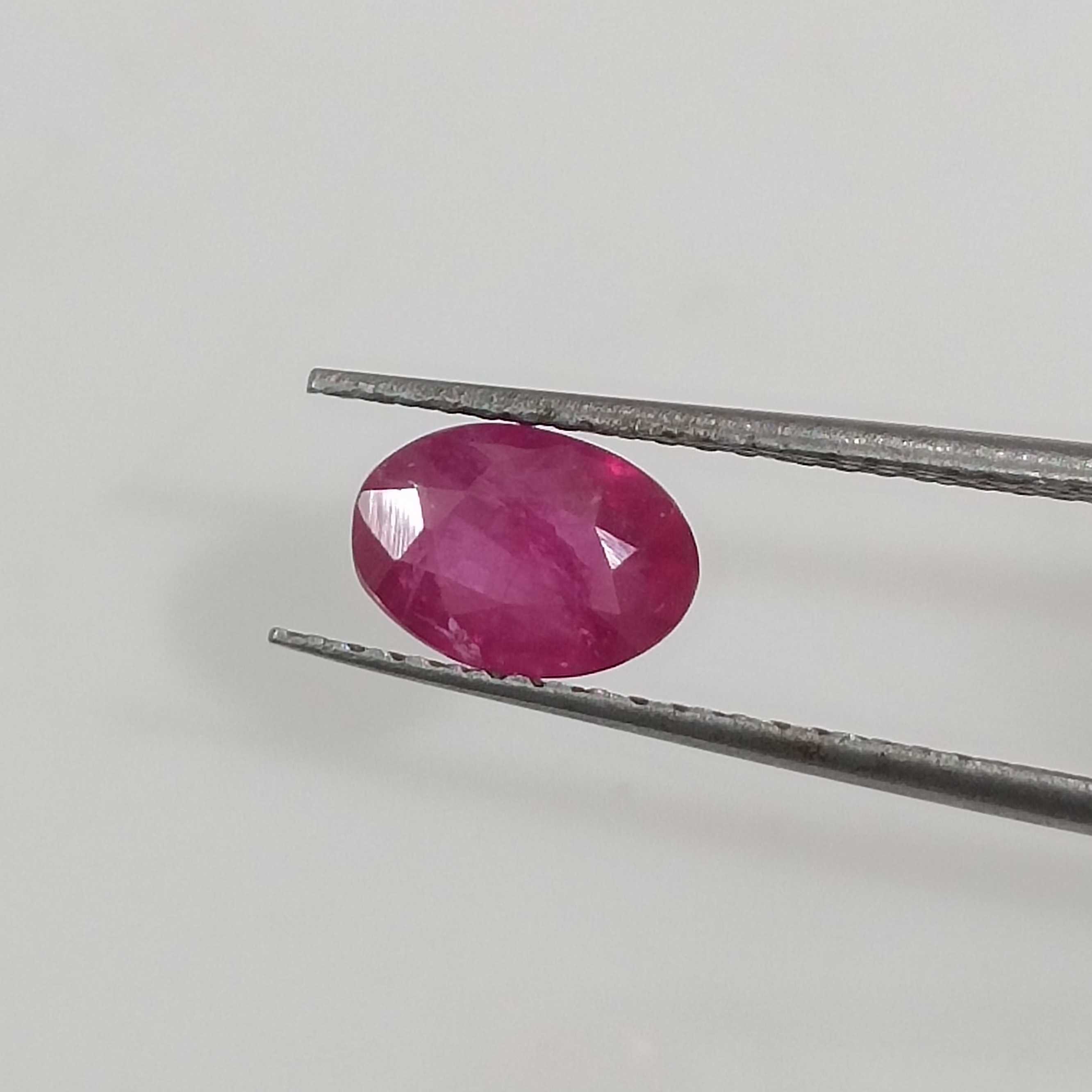 0.90ct GSI certified slightly pinkish red oval mixed natural Mozambique ruby 