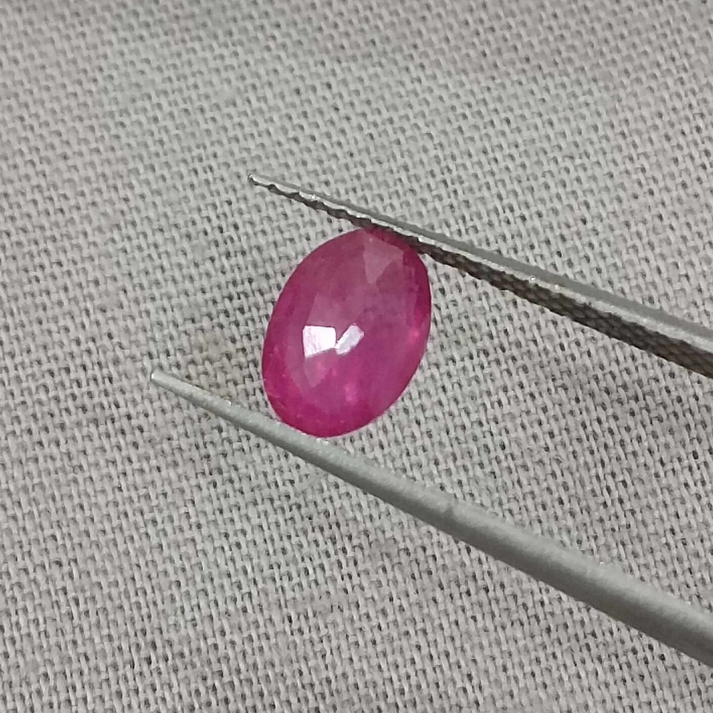 0.90ct GSI certified slightly pinkish red oval mixed natural Mozambique ruby 