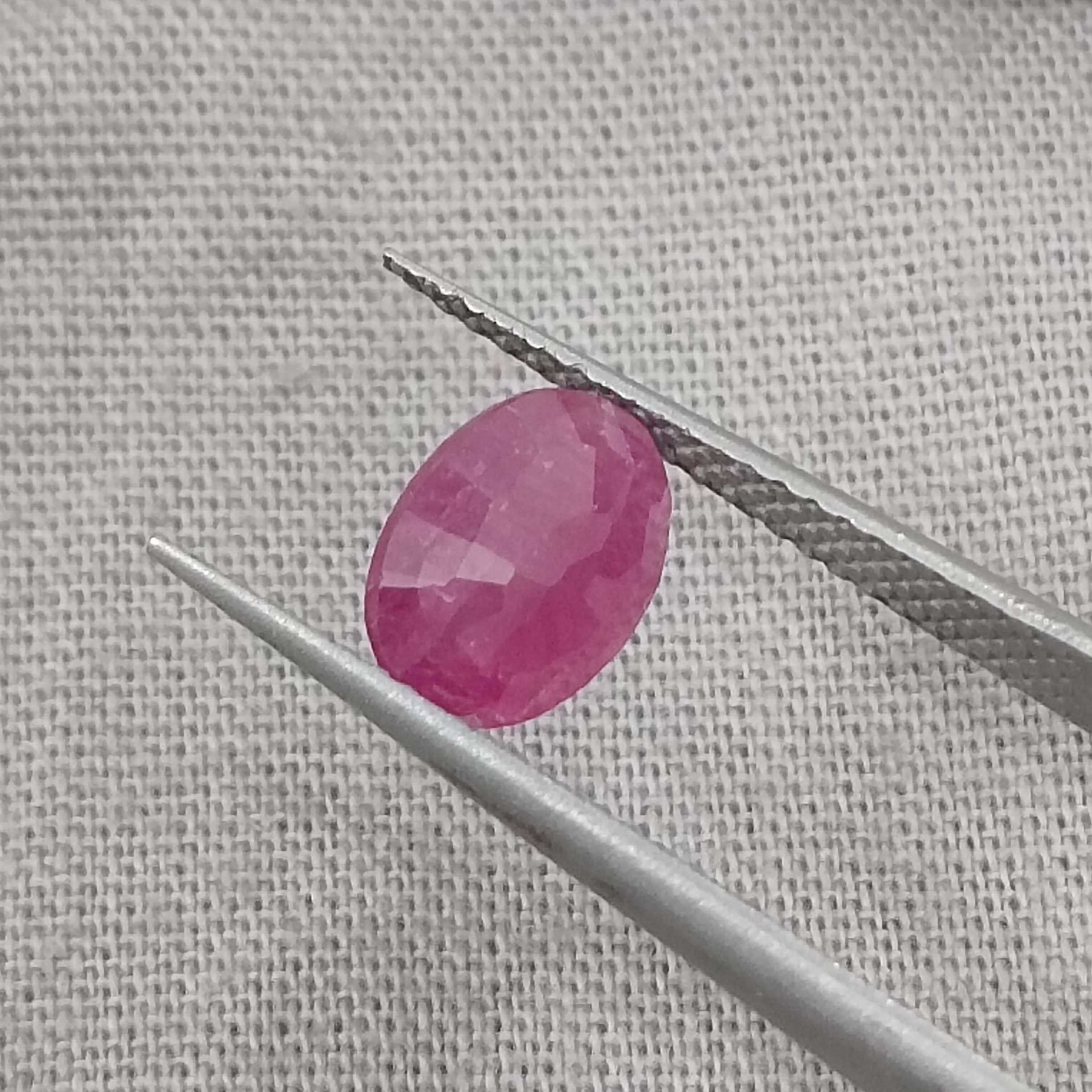 1.34cts GSI certified natural deep red with blue tint oval mixed cut unheated ruby 