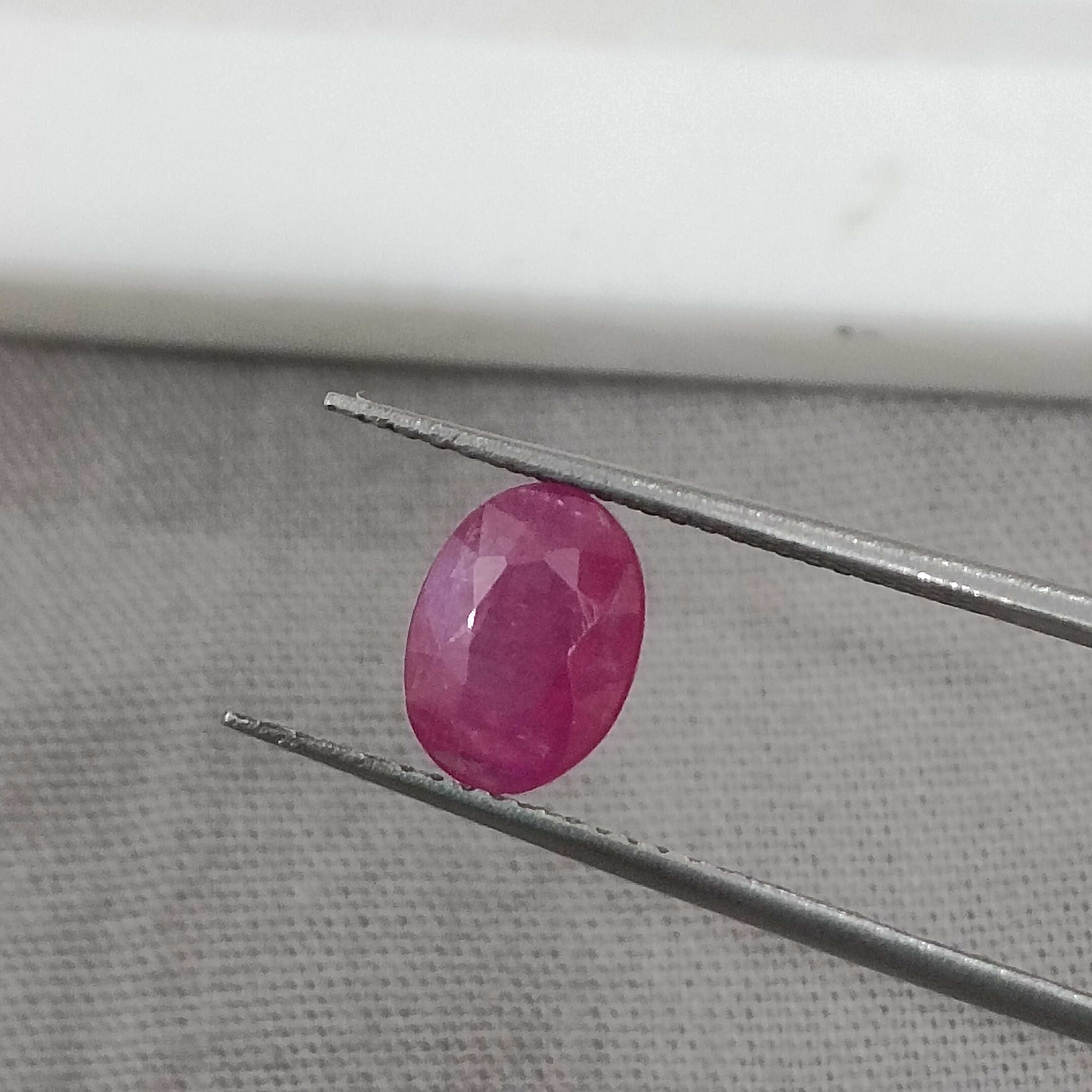 1.34cts GSI certified natural deep red with blue tint oval mixed cut unheated ruby 