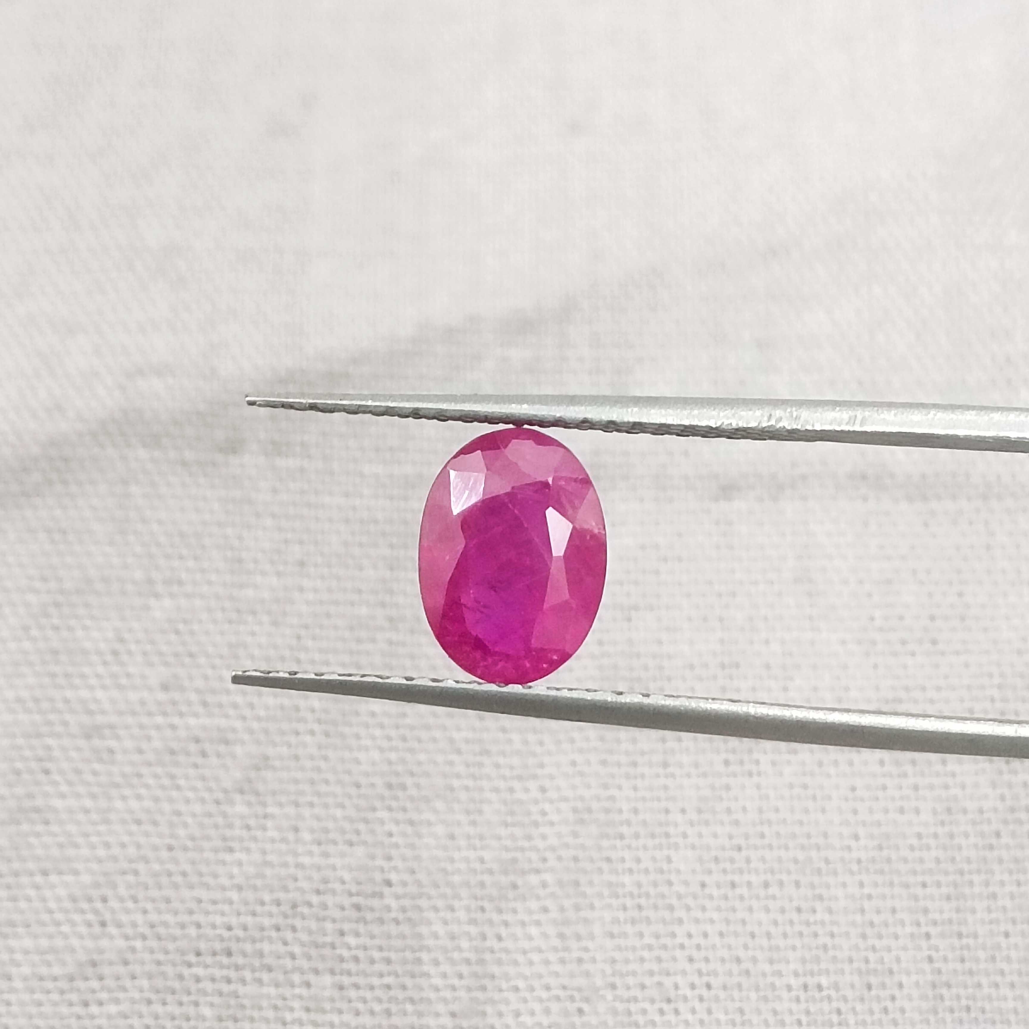 1.54cts GSI certified deep natural purplish red oval cut unheated Mozambique ruby stone