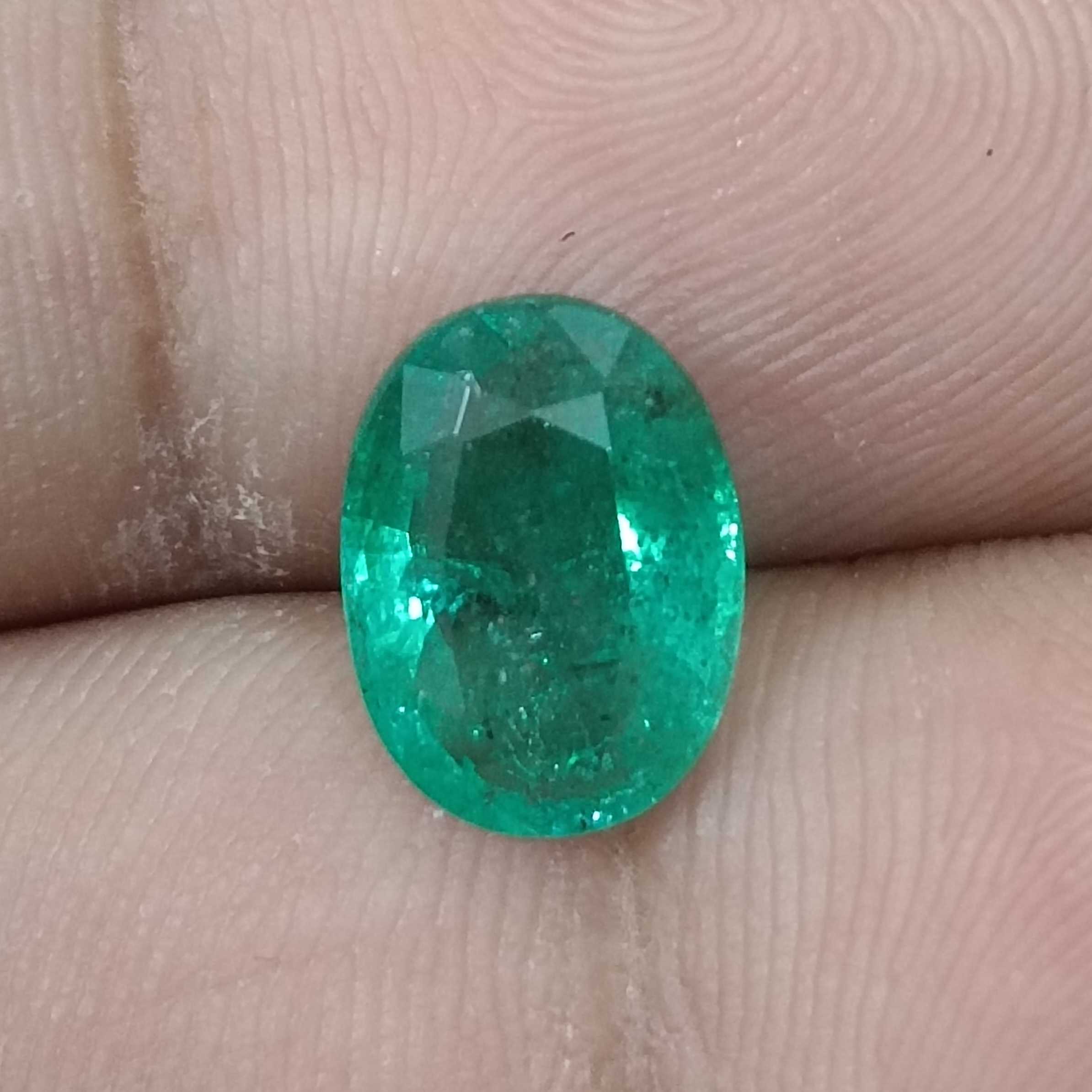 2.68cts GSI certified vivid golden green colour oval cut Zambian emerald/