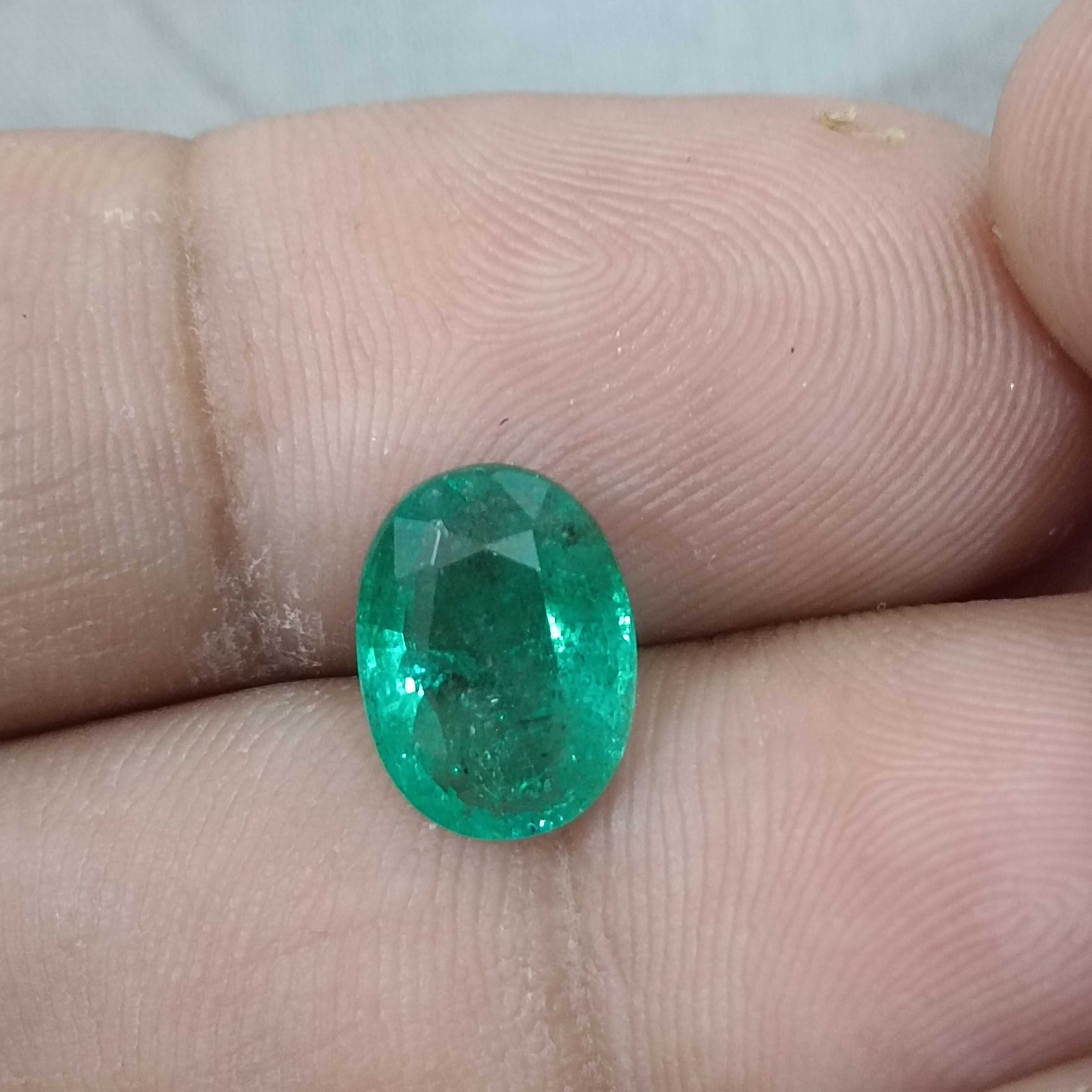 2.68cts GSI certified vivid golden green colour oval cut Zambian emerald