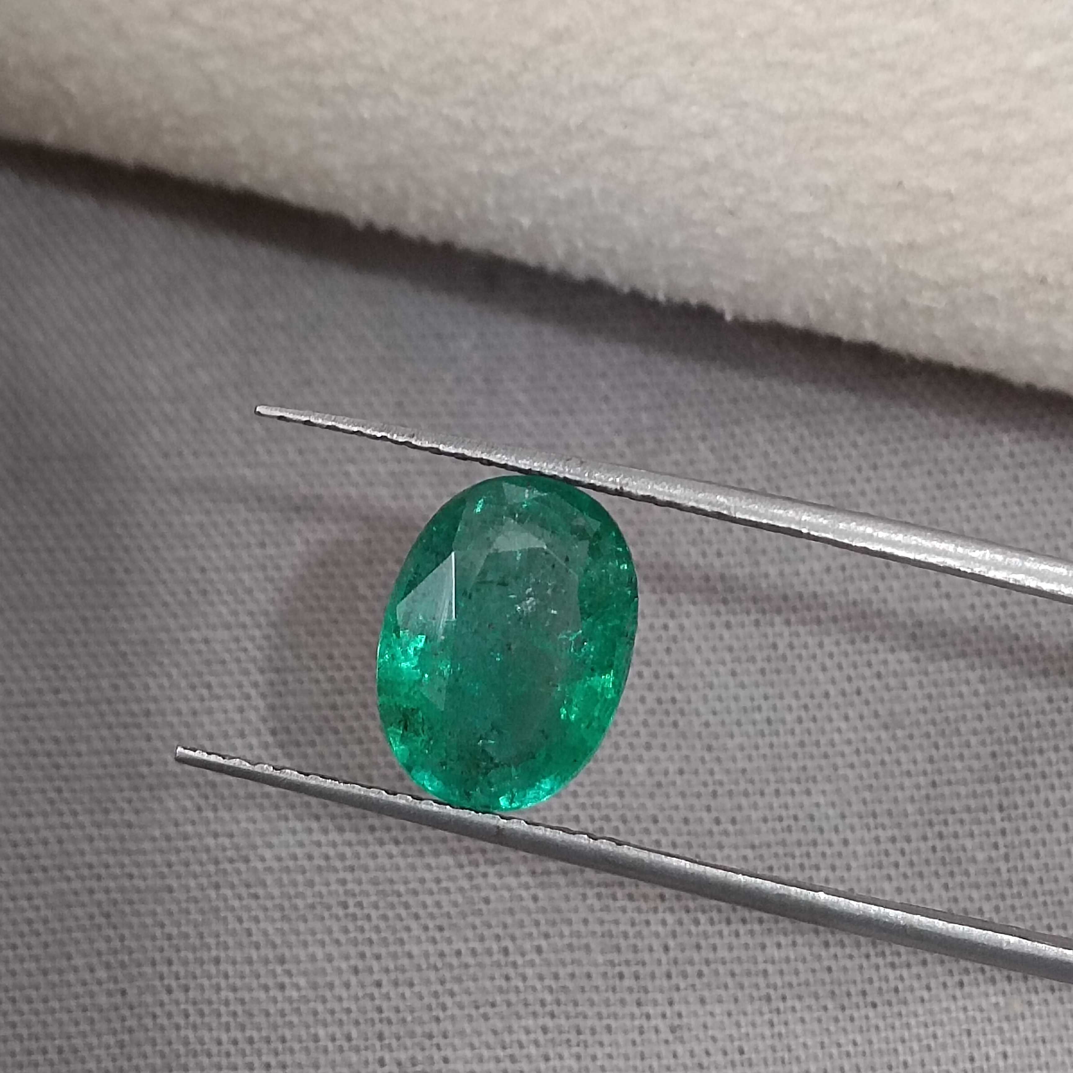 2.68cts GSI certified vivid golden green colour oval cut Zambian emerald