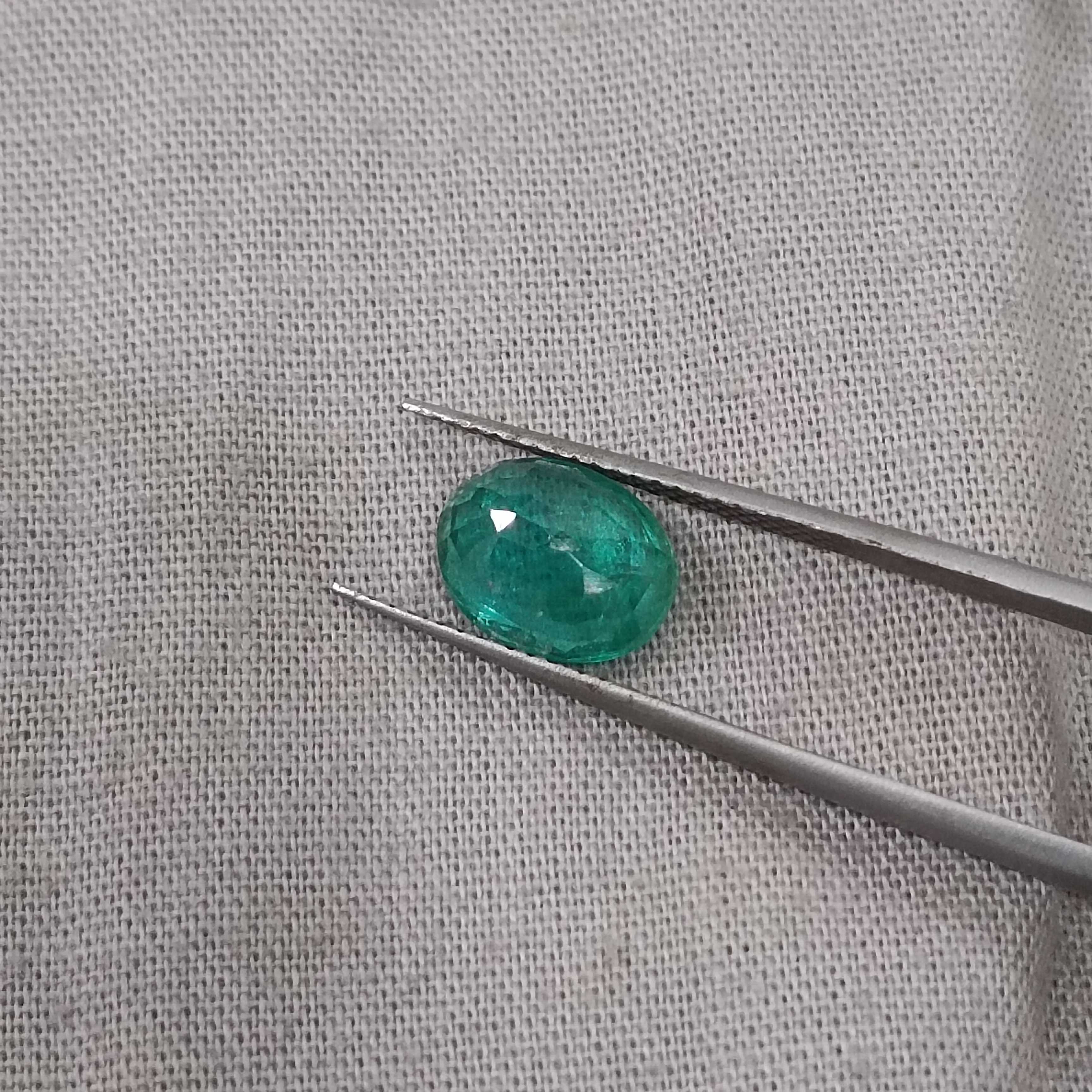 2.07cts certified forest green oval shaped Zambian emerald 