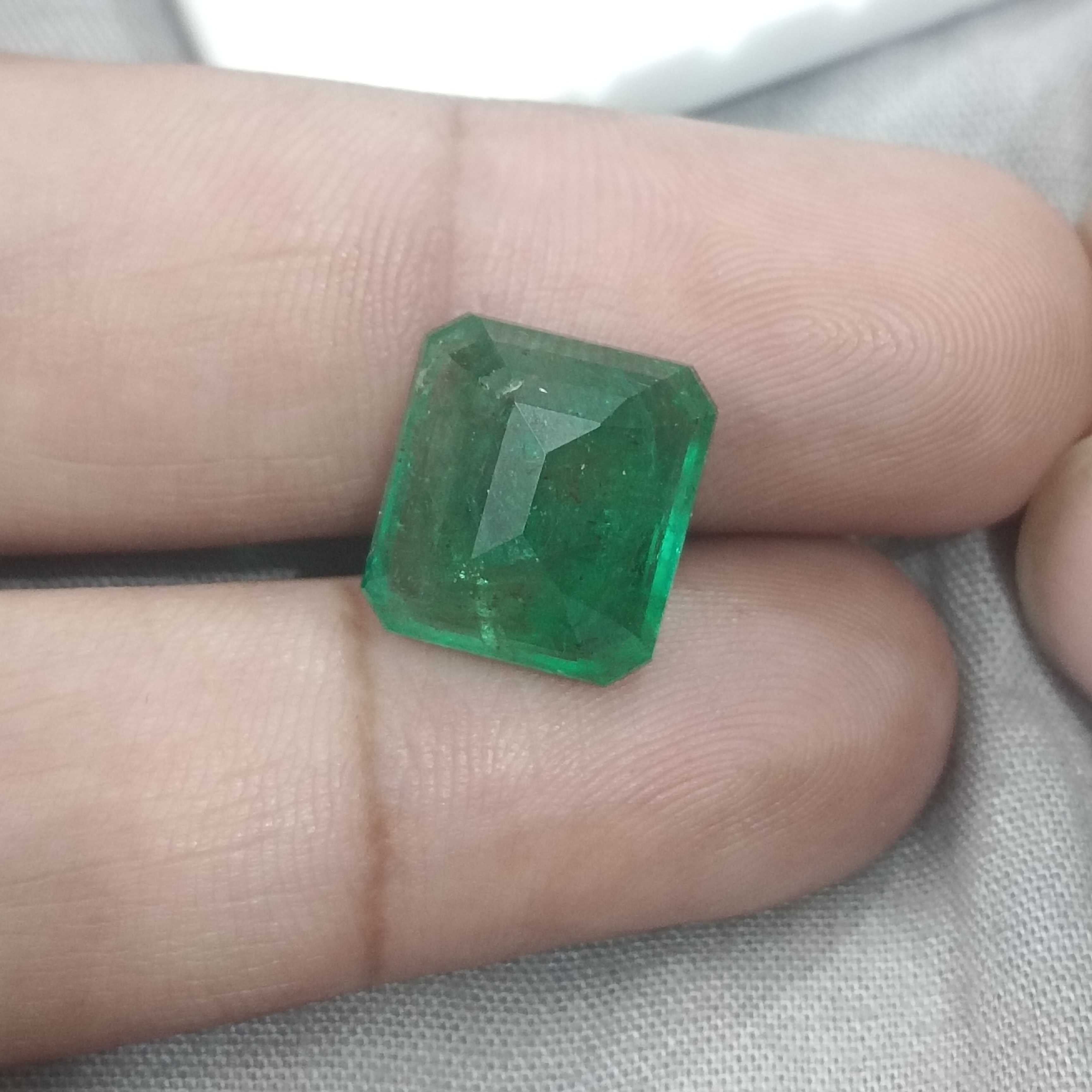 10.58cts certified natural vivid green octagon cut Swat emerald gemstone