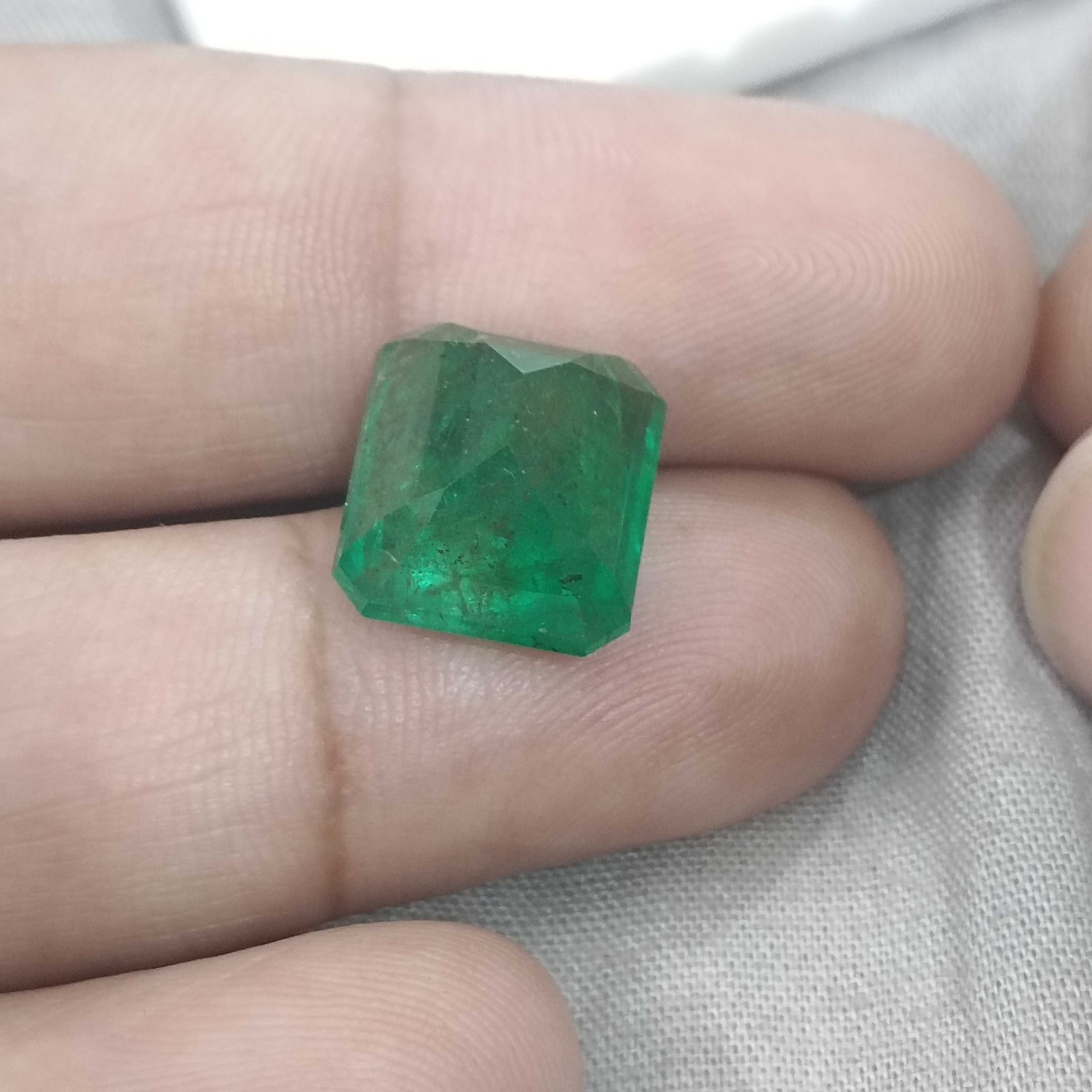 10.58cts certified natural vivid green octagon cut Swat emerald gemstone