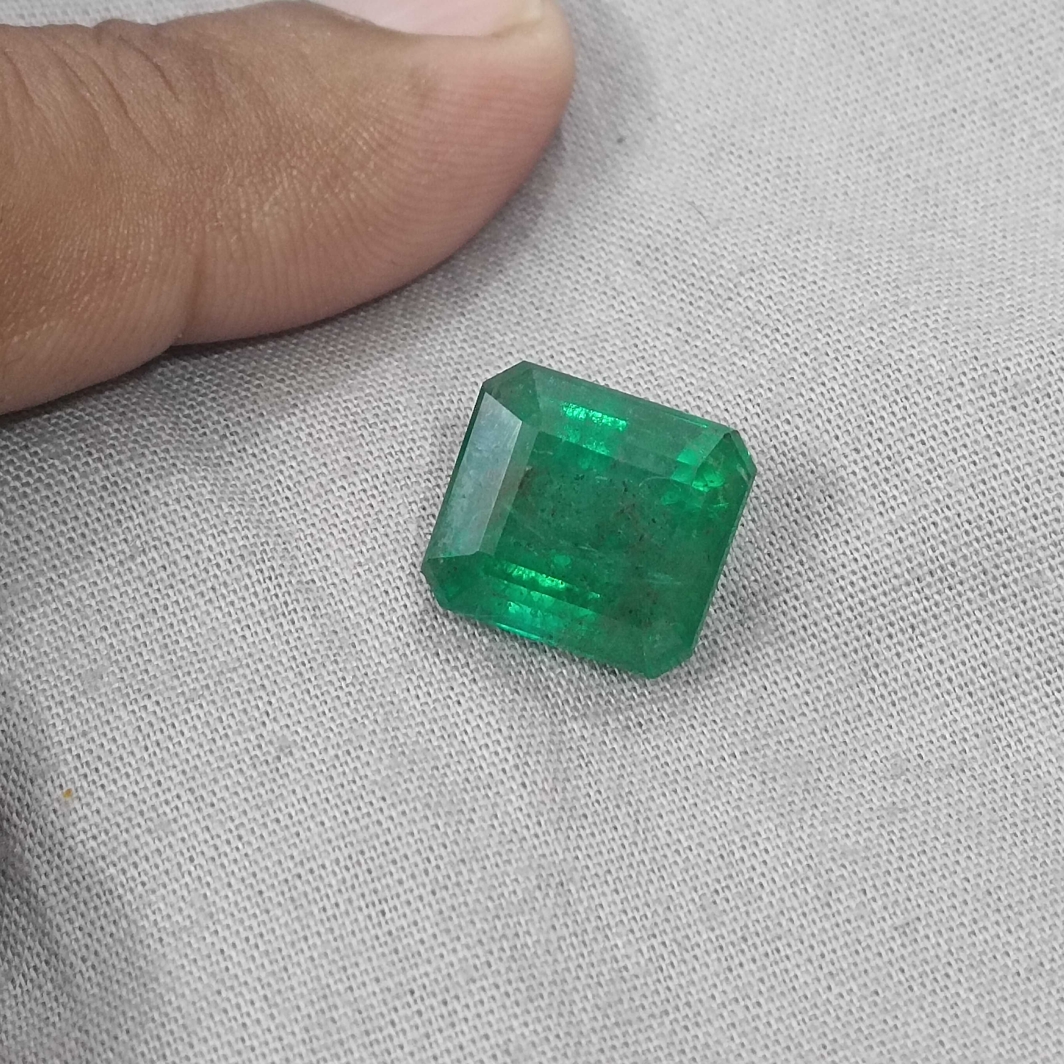 10.58cts certified natural vivid green octagon cut Swat emerald gemstone