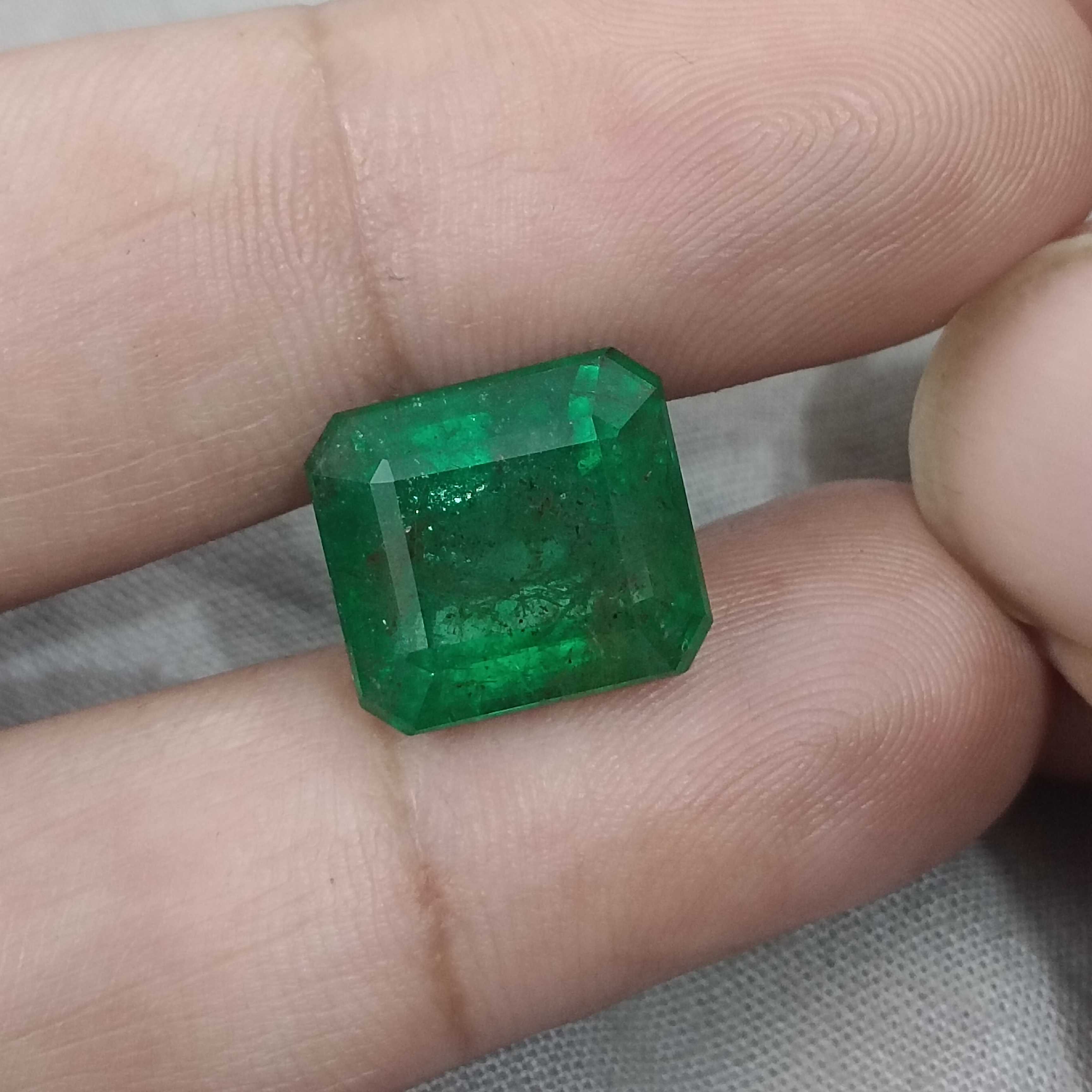 10.58cts certified natural vivid green octagon cut Swat emerald gemstone