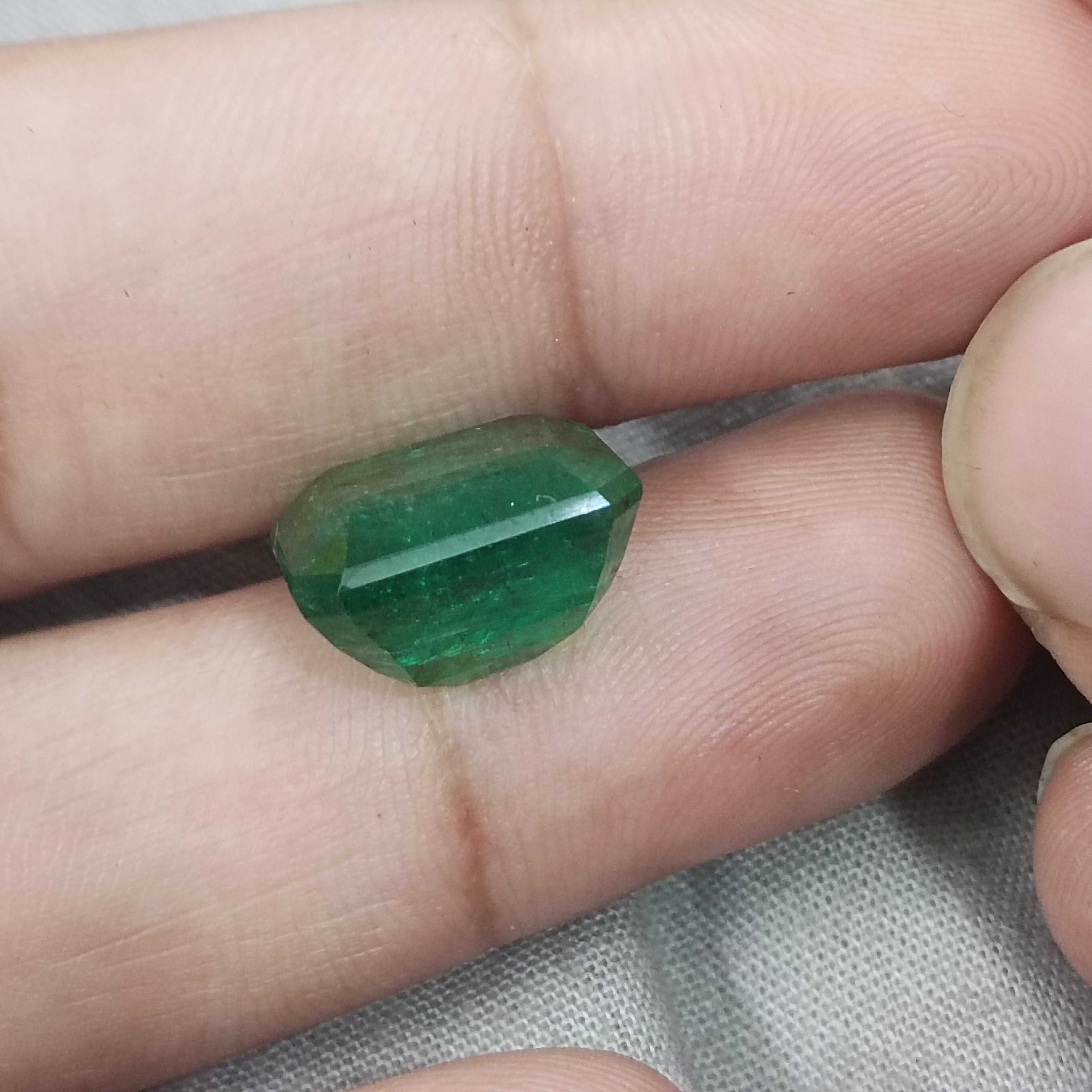 10.58cts certified natural vivid green octagon cut Swat emerald gemstone