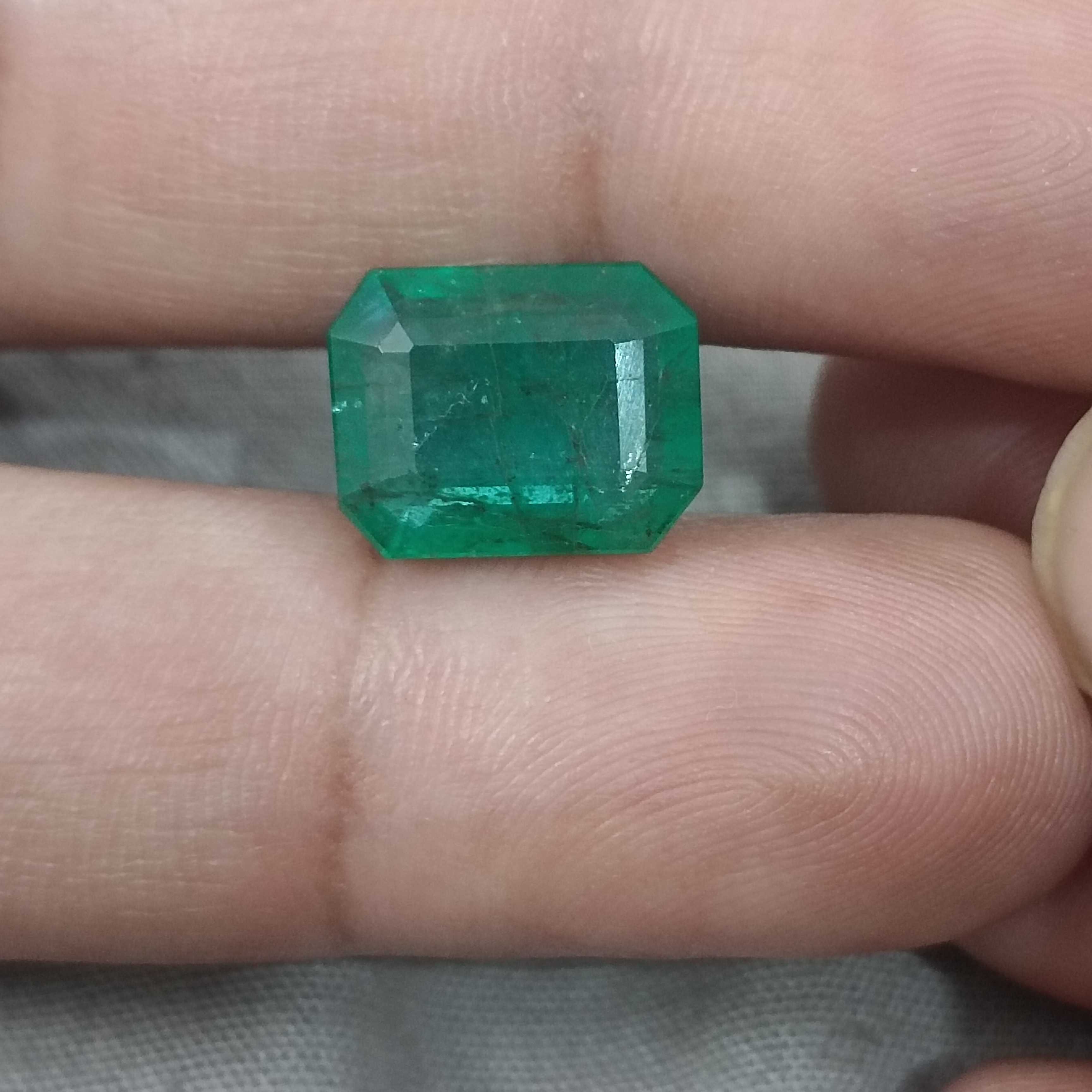 6.62cts deep natural green octagon cut Zambian emerald gemstone 