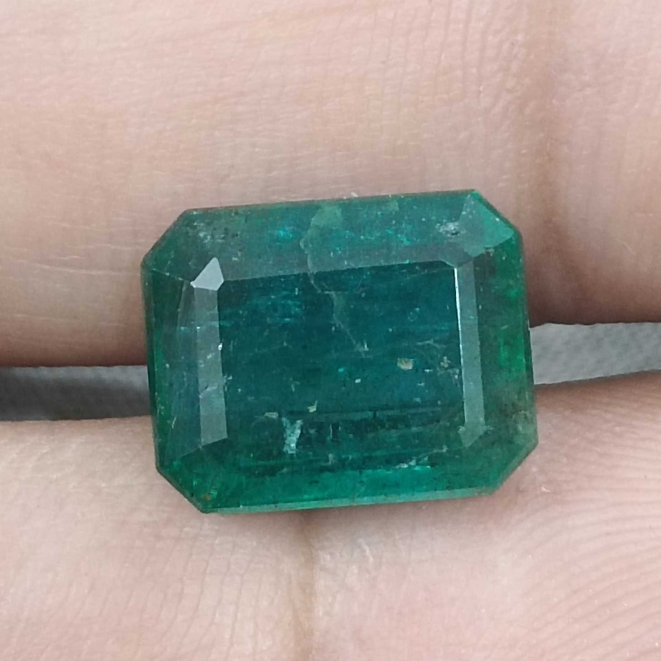 6.19cts bluish deep green octagon cut Zambian origin emerald gemstone /