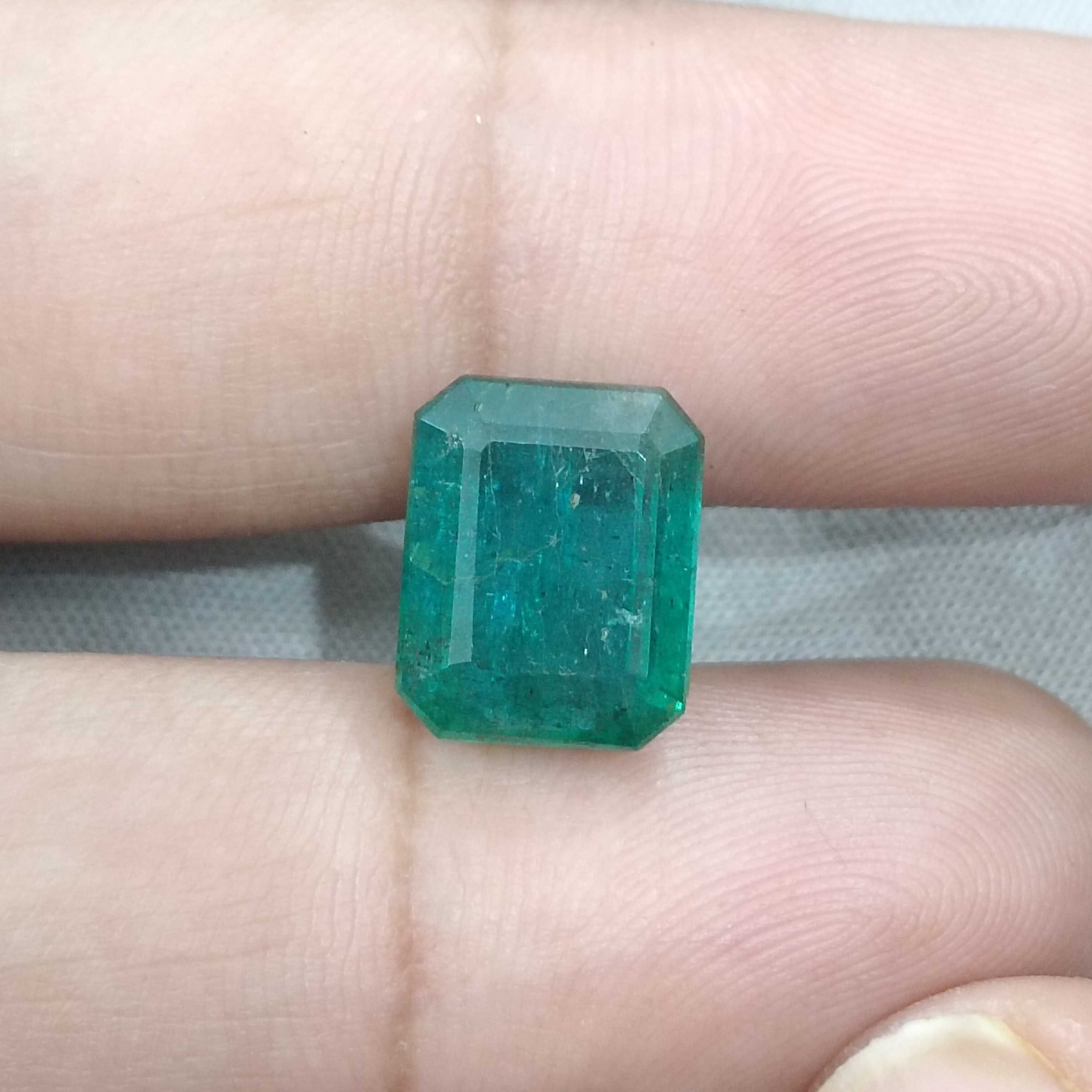 6.19cts bluish deep green octagon cut Zambian origin emerald gemstone 