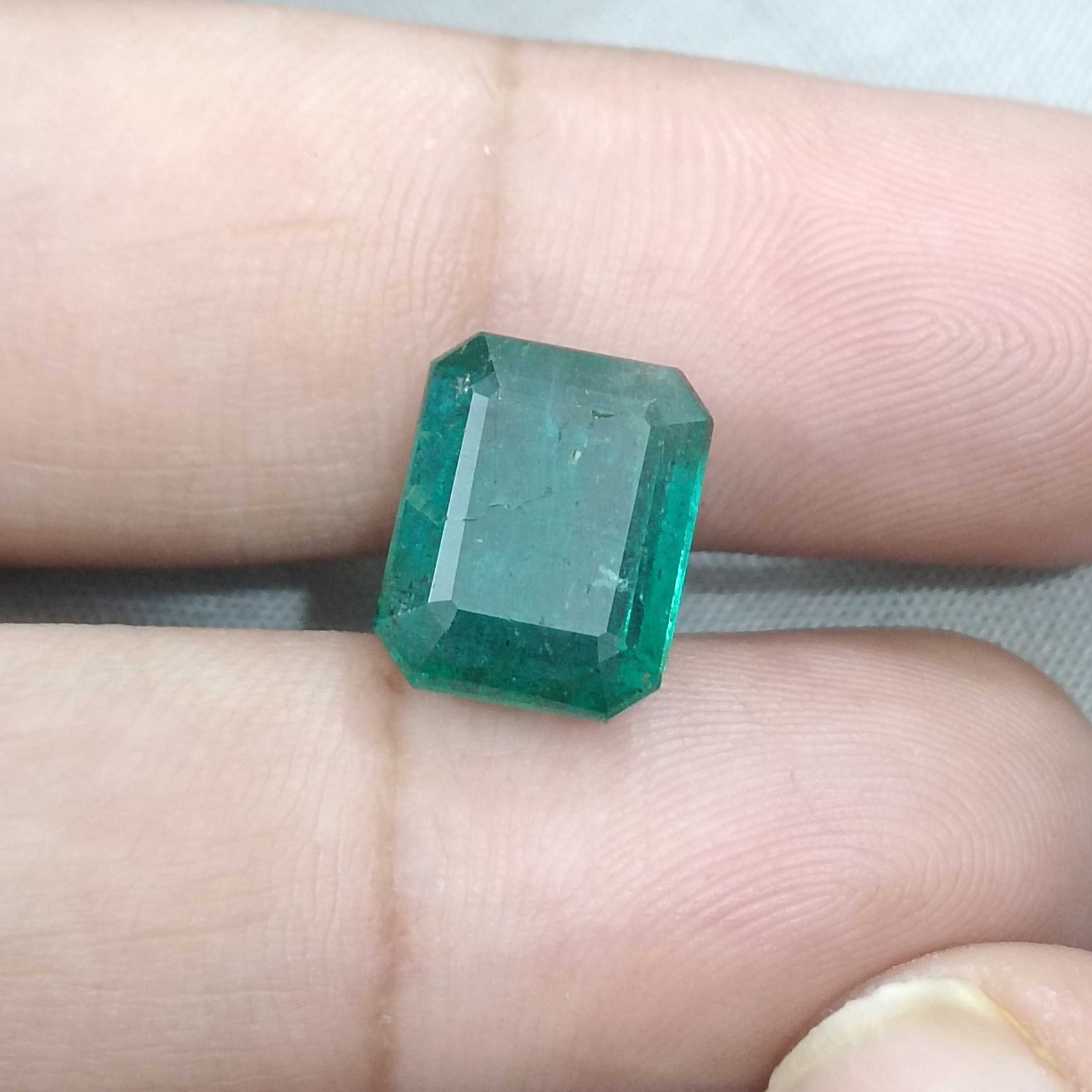 6.19cts bluish deep green octagon cut Zambian origin emerald gemstone 