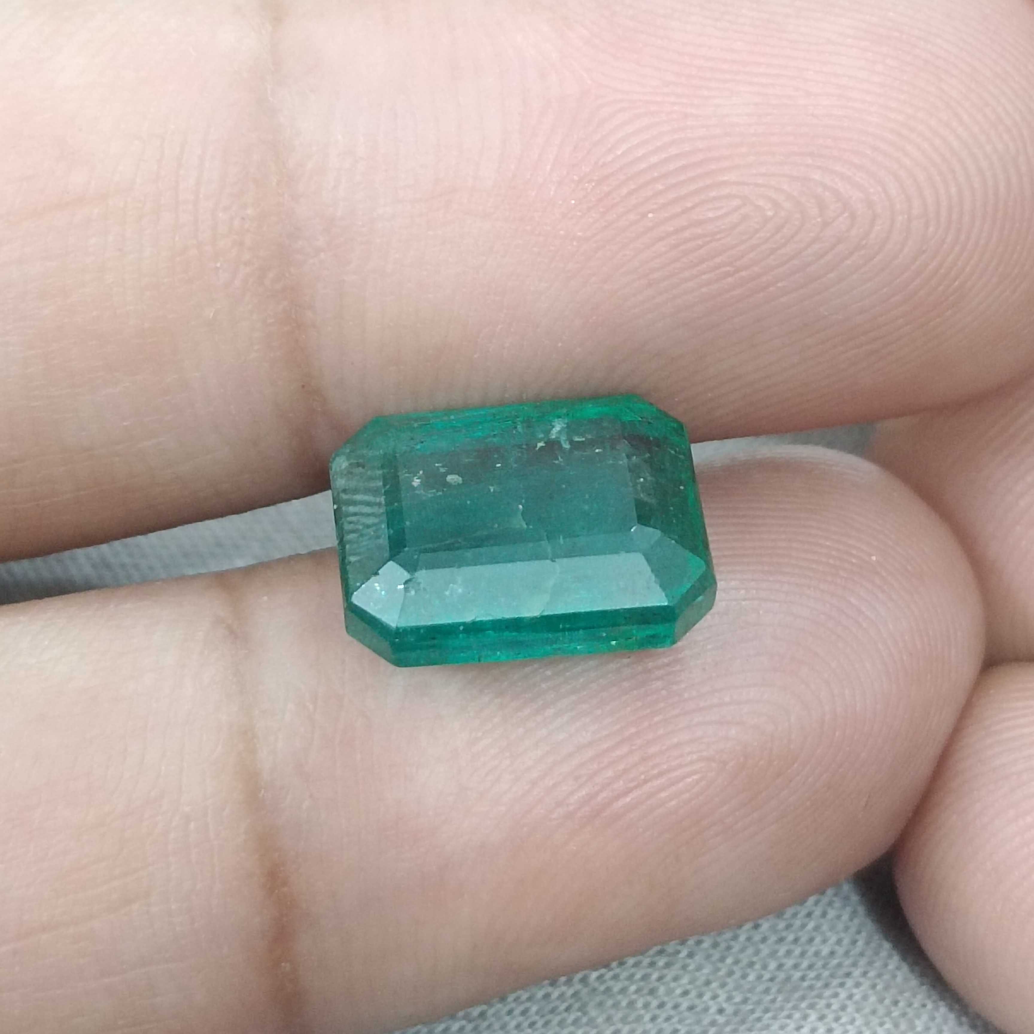 6.19cts bluish deep green octagon cut Zambian origin emerald gemstone 