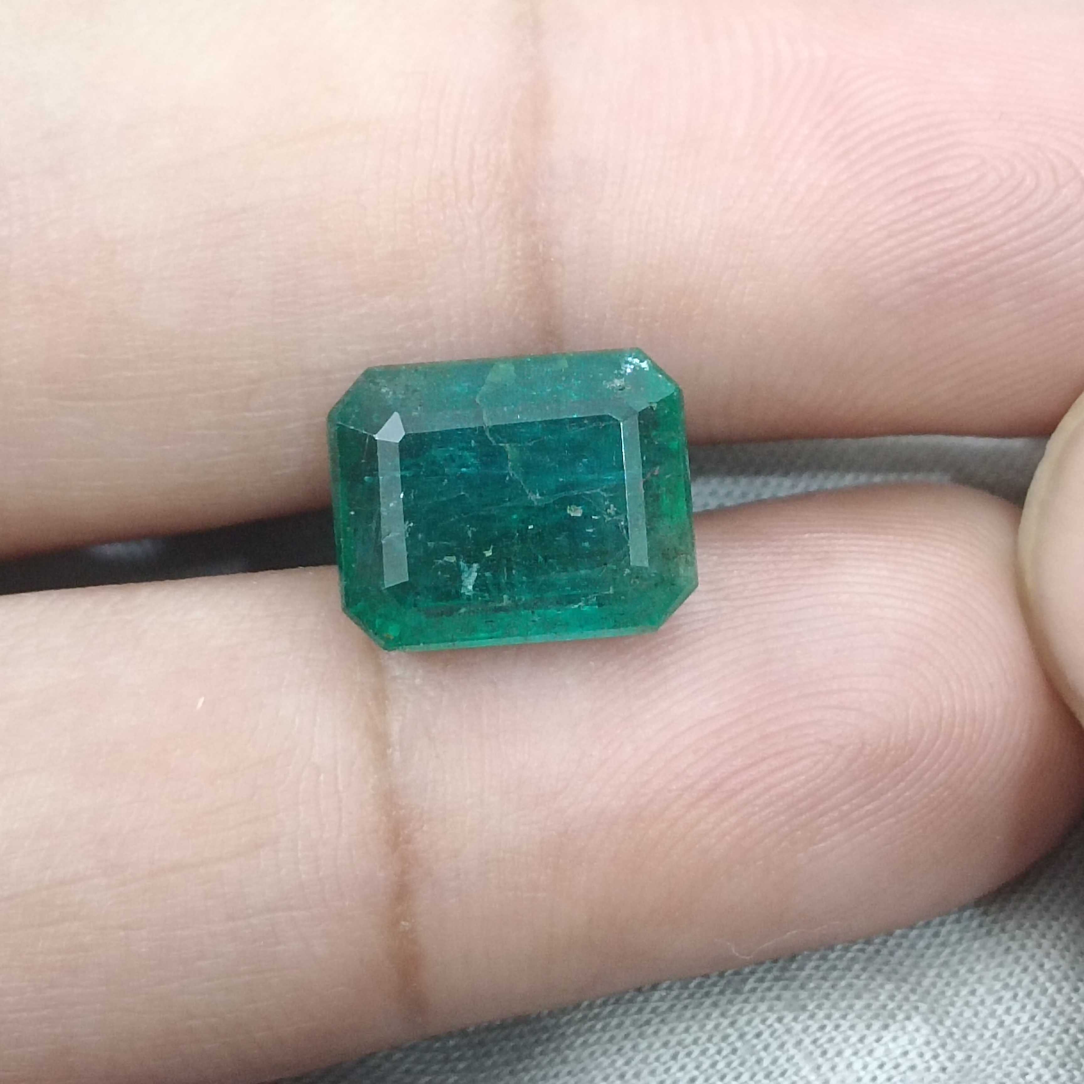 6.19cts bluish deep green octagon cut Zambian origin emerald gemstone 