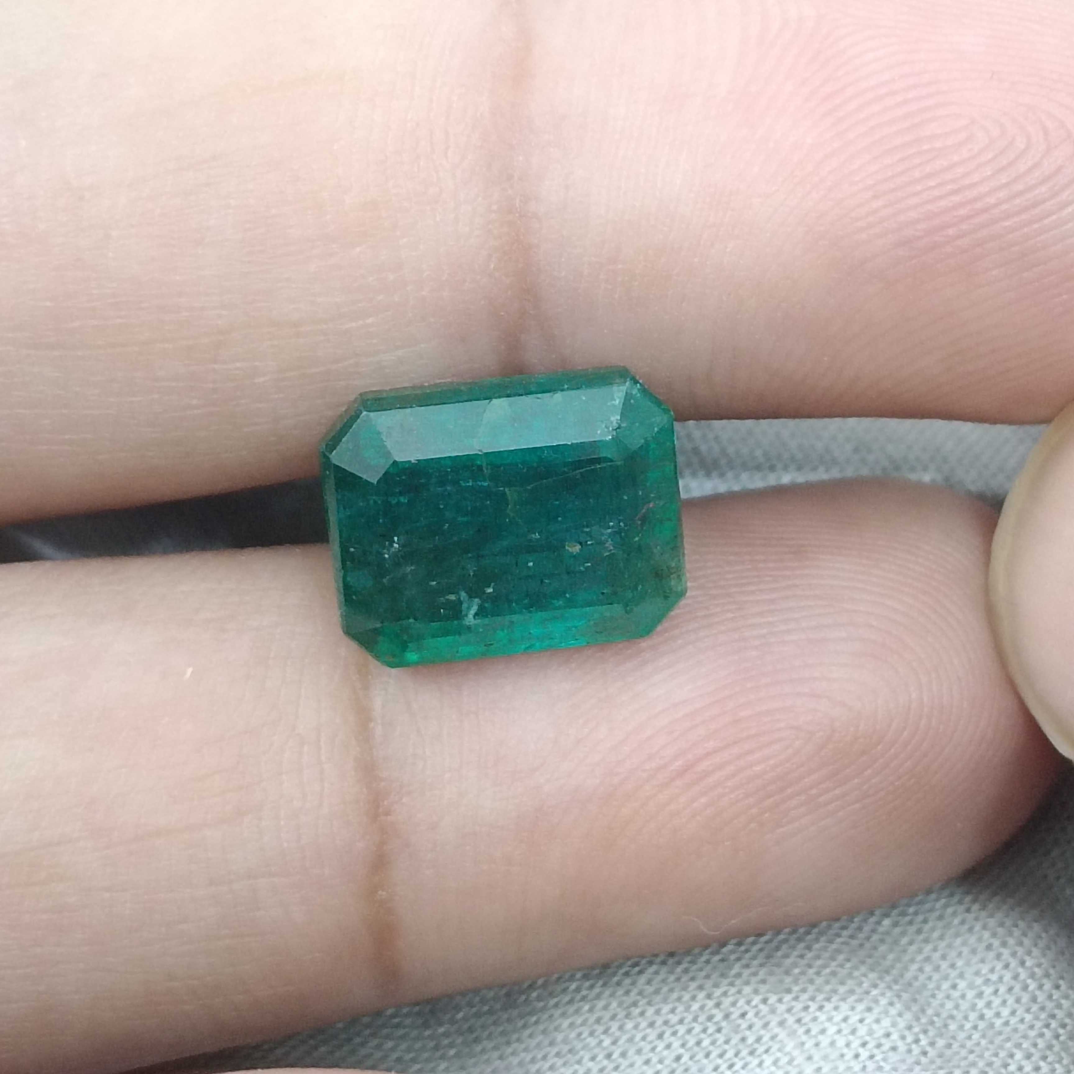 6.19cts bluish deep green octagon cut Zambian origin emerald gemstone 