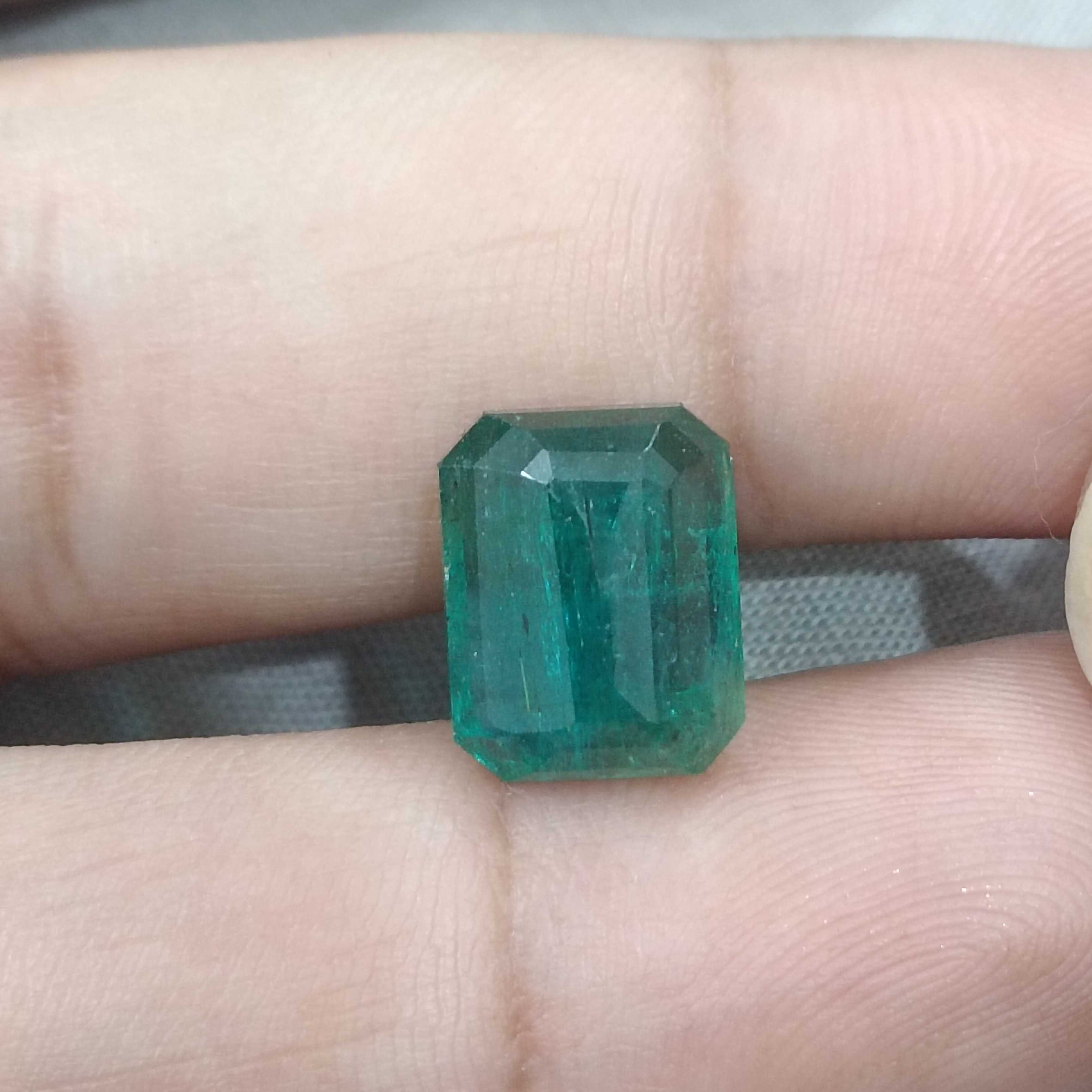 6.19cts bluish deep green octagon cut Zambian origin emerald gemstone 