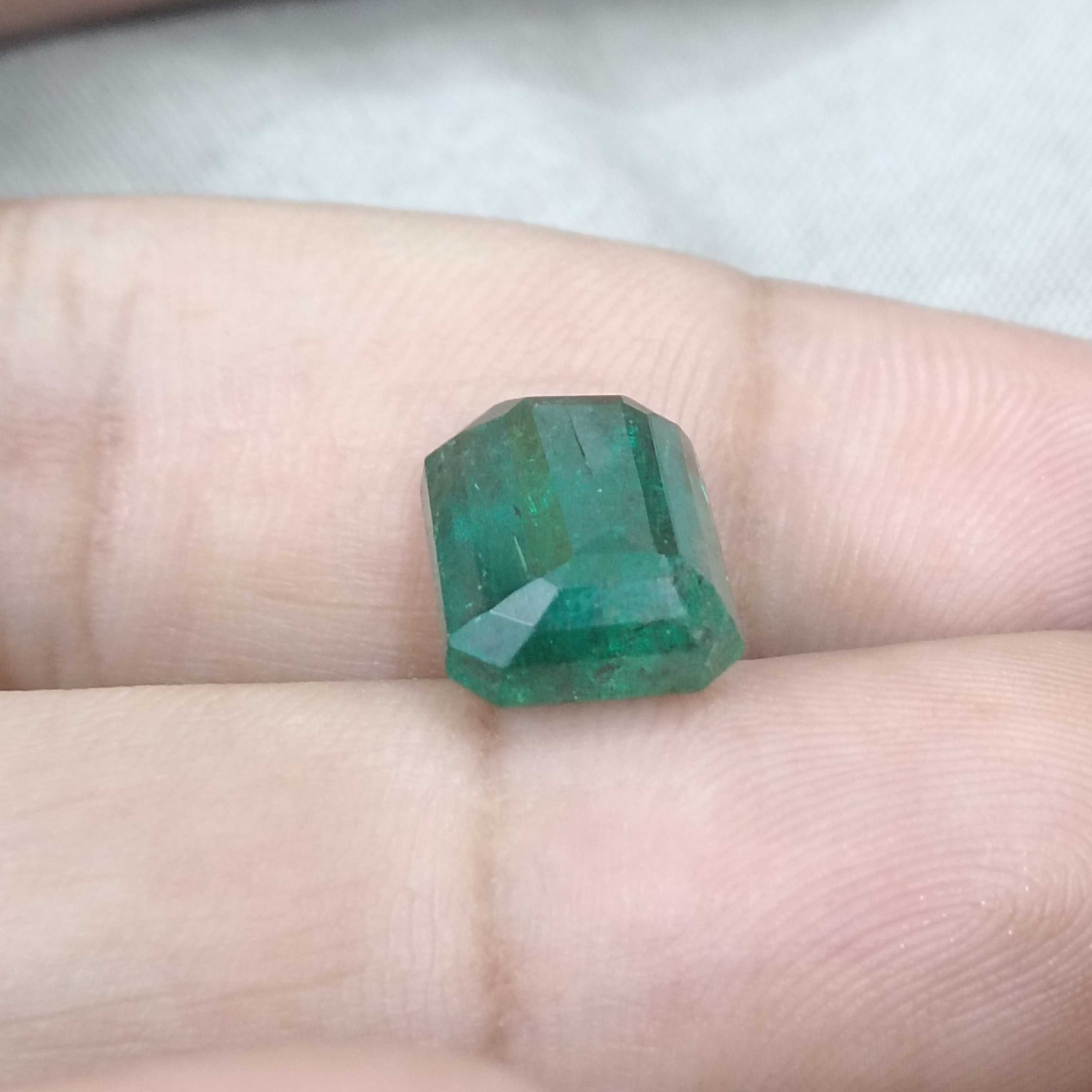 6.19cts bluish deep green octagon cut Zambian origin emerald gemstone 