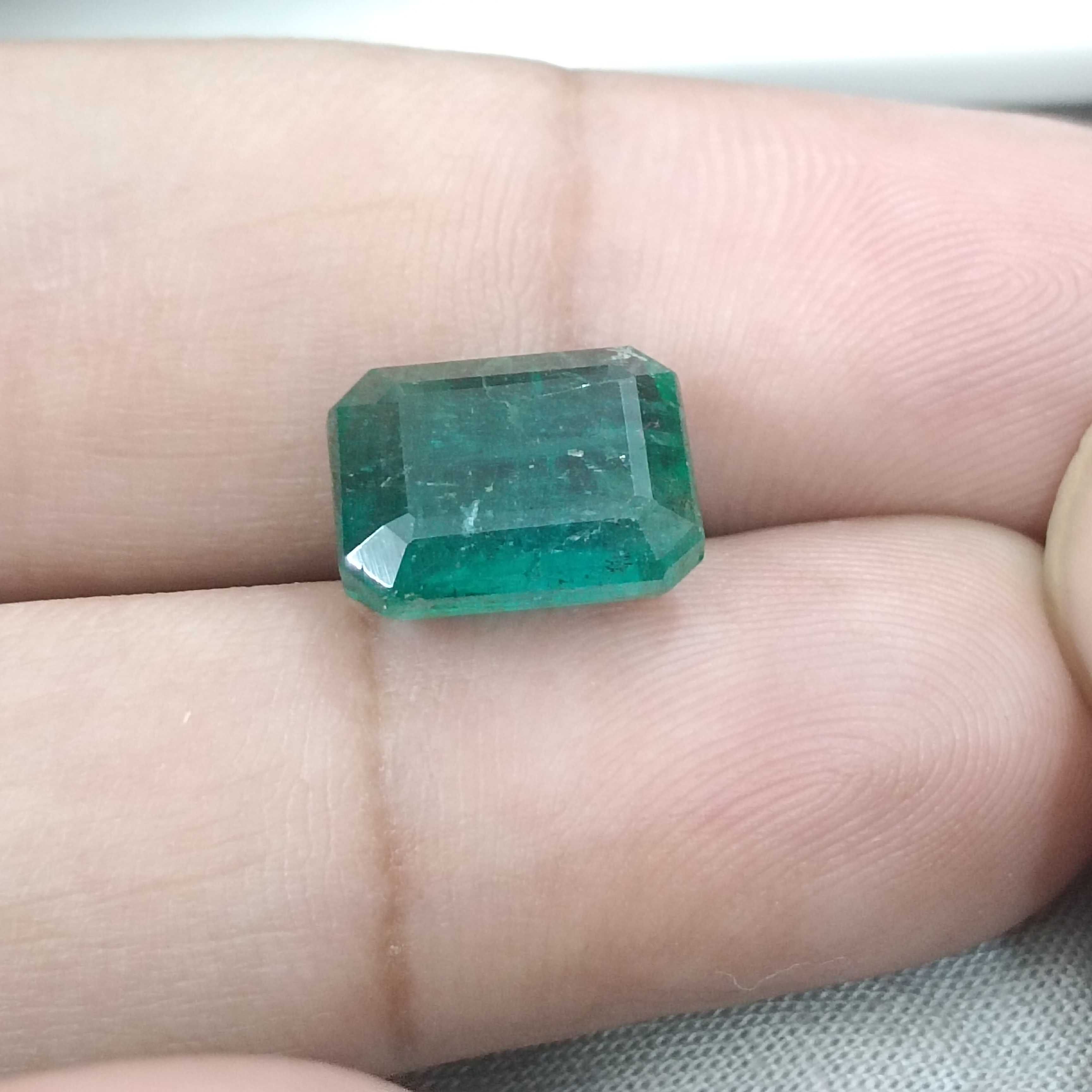 6.19cts bluish deep green octagon cut Zambian origin emerald gemstone 