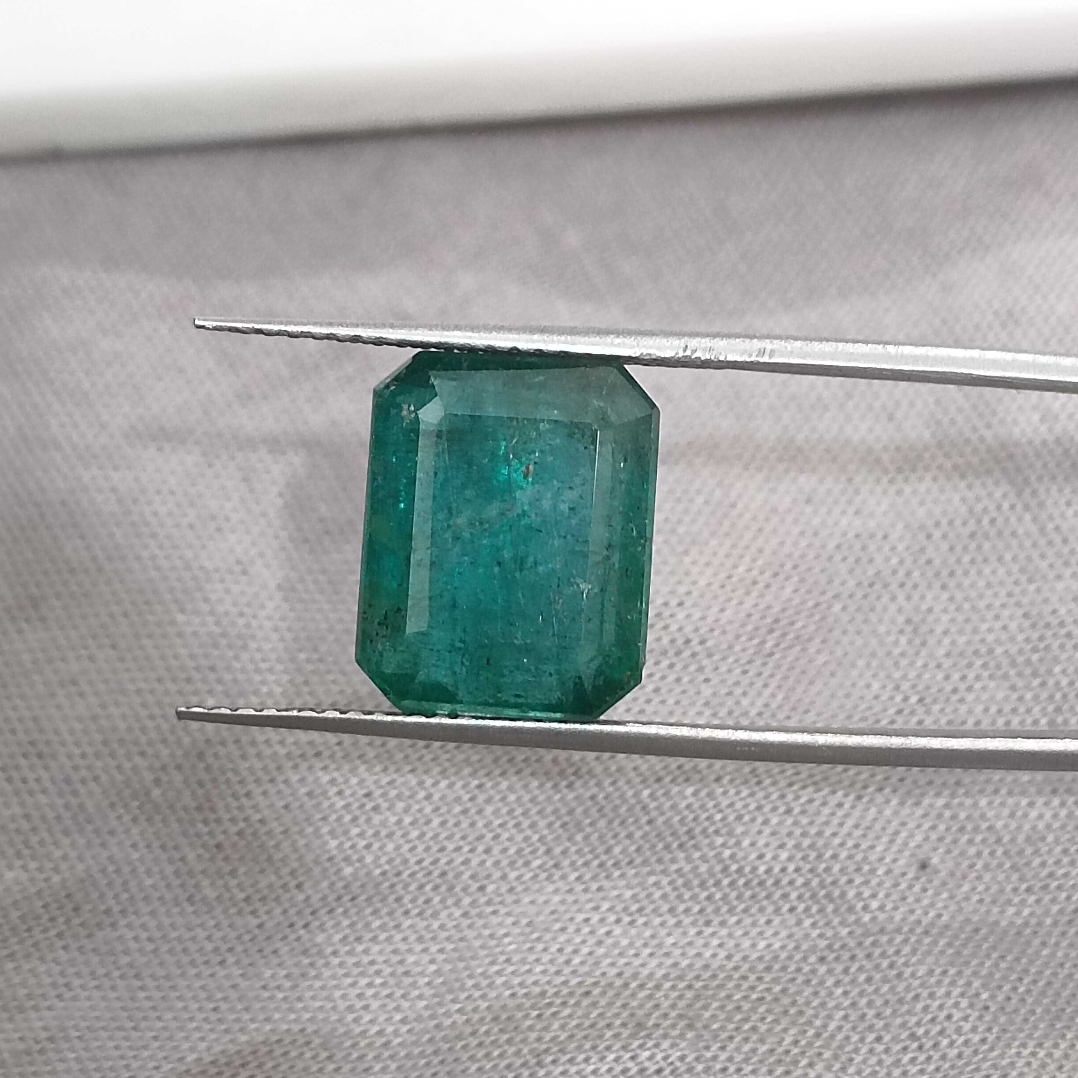 6.19cts bluish deep green octagon cut Zambian origin emerald gemstone 