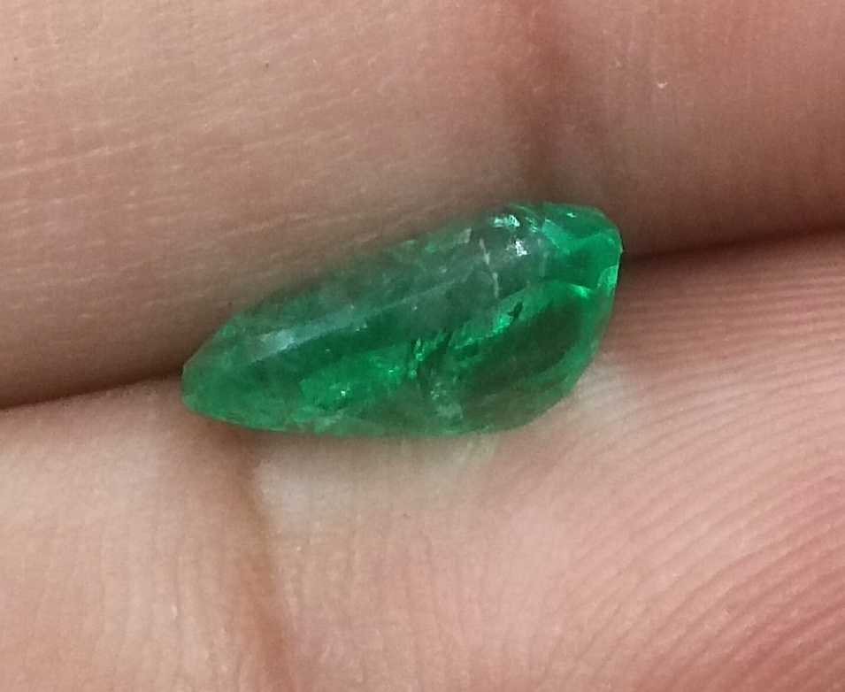 2.57ct GSI certified neon green oval cut Zambian emerald 