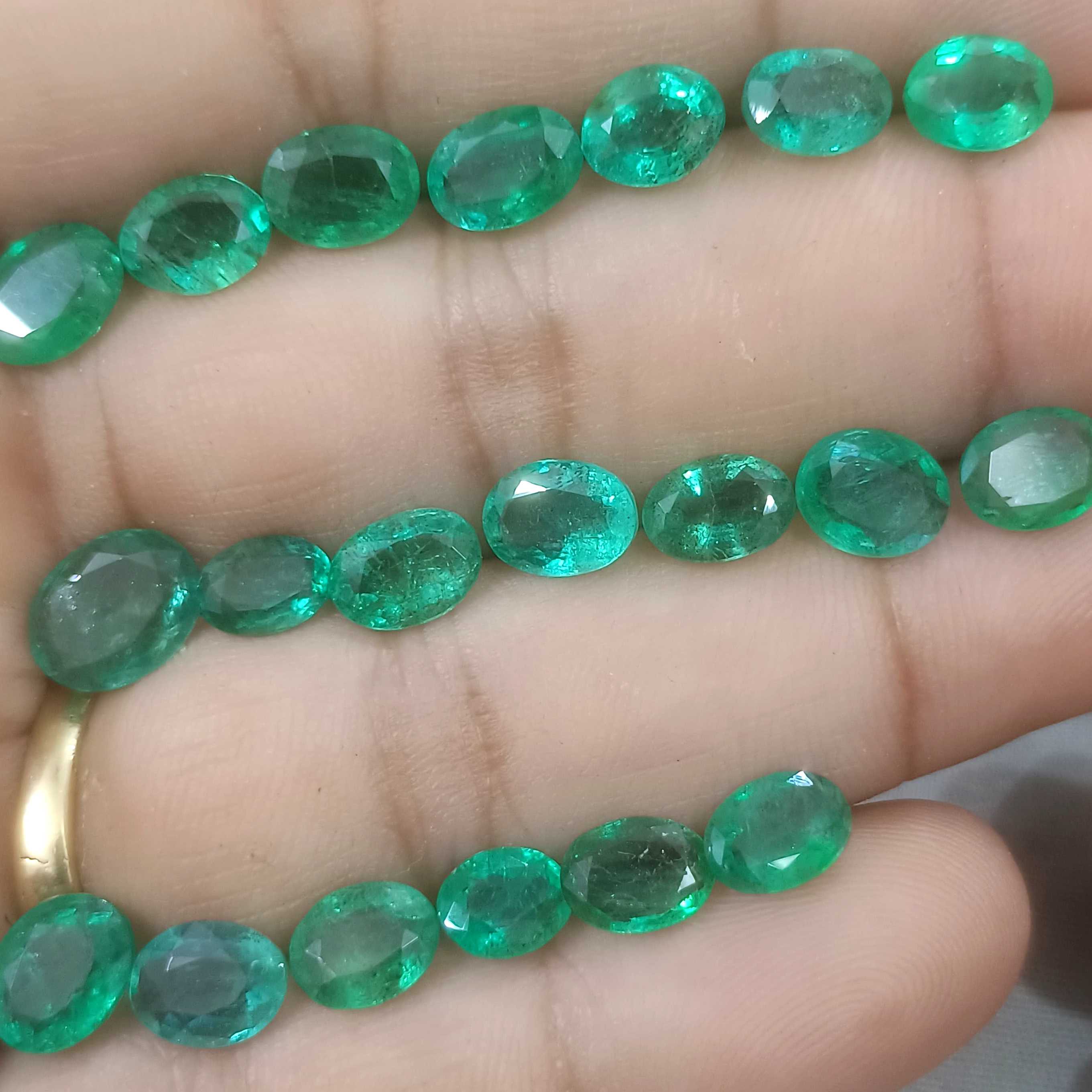 24.31ct oval cut shiny natural loose Zambian emerald wholesale parcel /