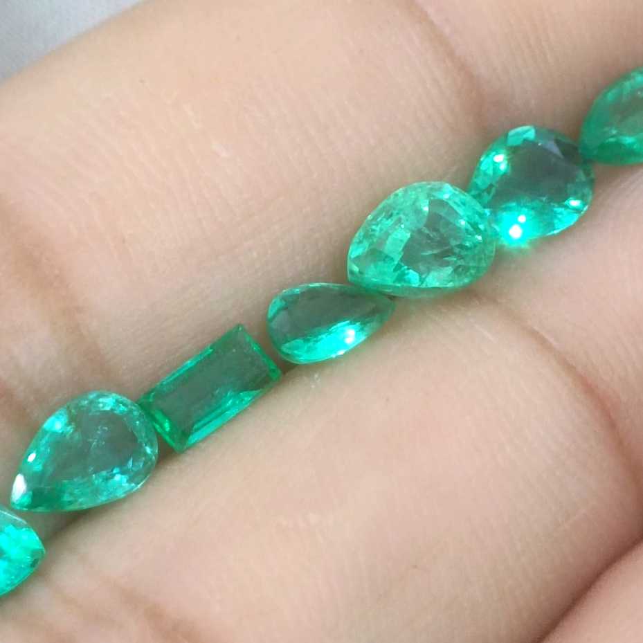4.33ct medium to medium deep clean electric green loose Zambian emeralds/