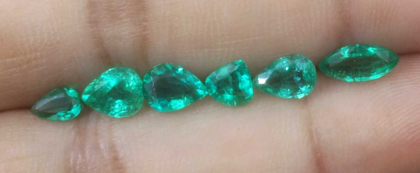 4.33ct medium to medium deep clean electric green loose Zambian emeralds
