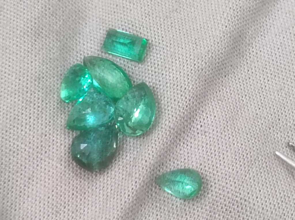 4.33ct medium to medium deep clean electric green loose Zambian emeralds