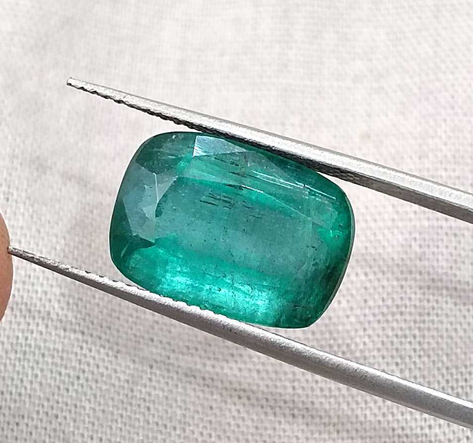 7.34ct deep bluish green cushion cut Zambian emerald cut stone