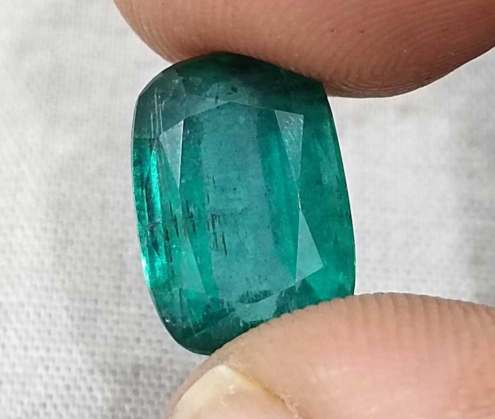 7.34ct deep bluish green cushion cut Zambian emerald cut stone
