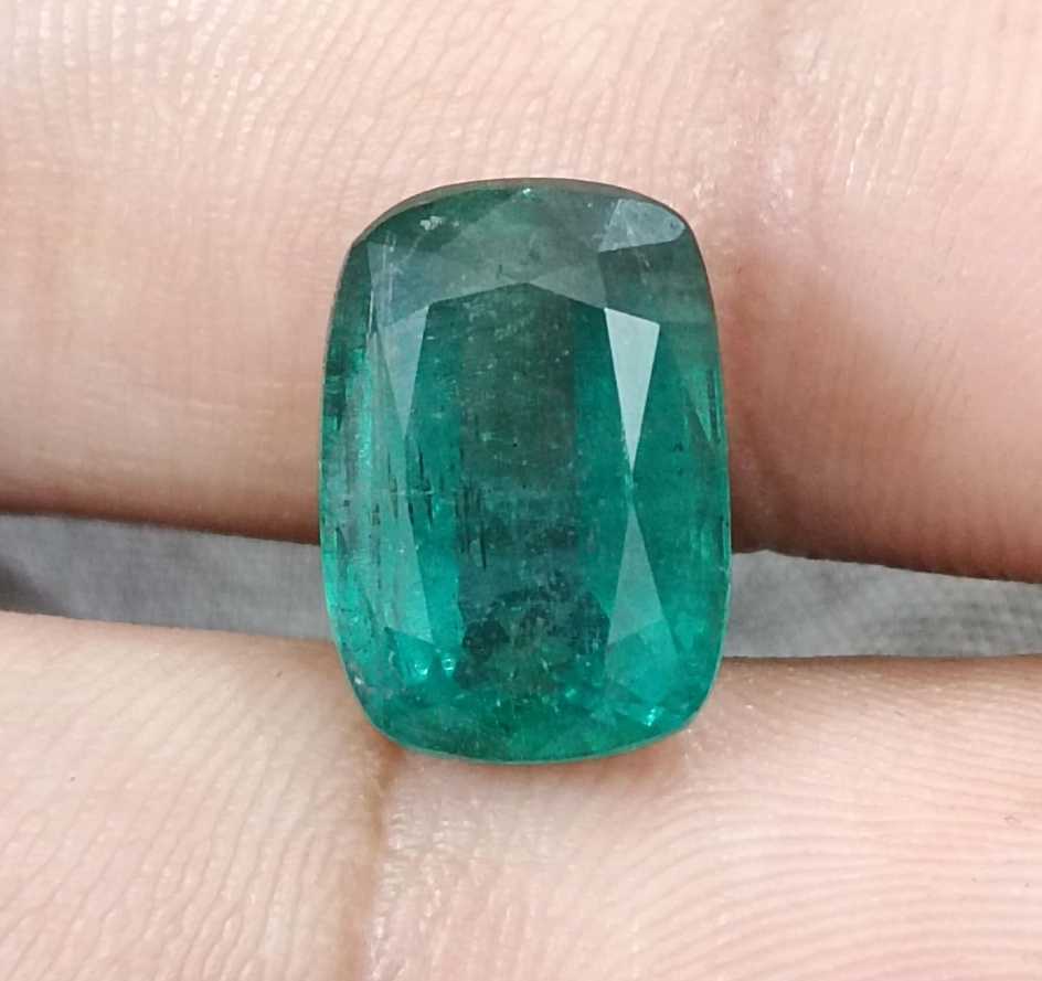 7.34ct deep bluish green cushion cut Zambian emerald cut stone