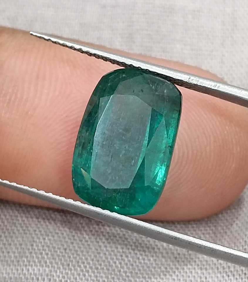 7.34ct deep bluish green cushion cut Zambian emerald cut stone