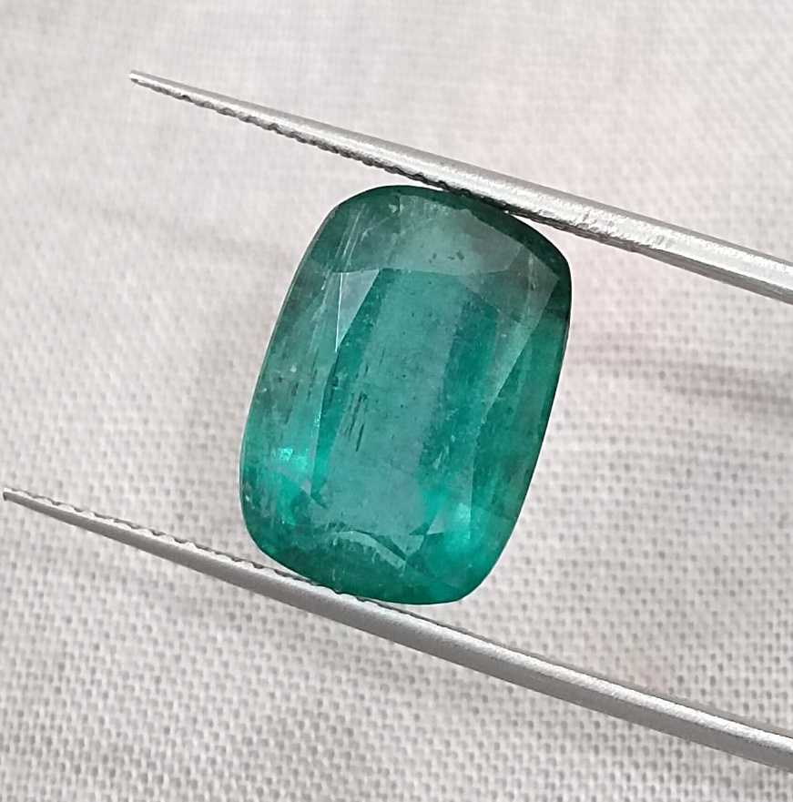 7.34ct deep bluish green cushion cut Zambian emerald cut stone
