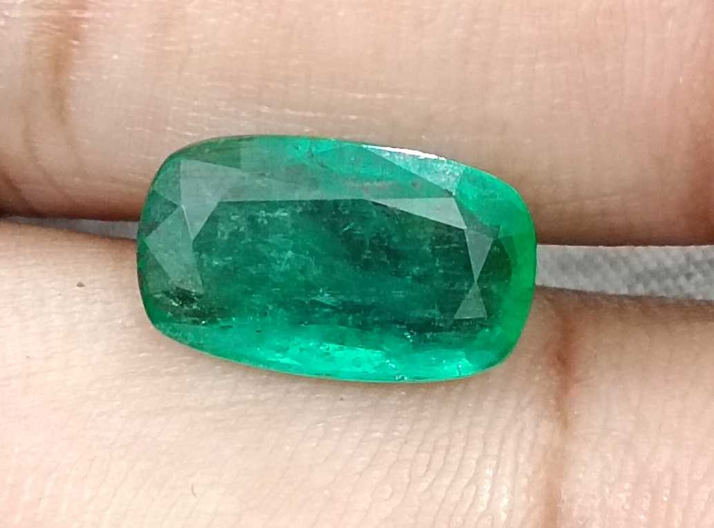 3.99ct deep green colour cushion cut Zambian emerald stone