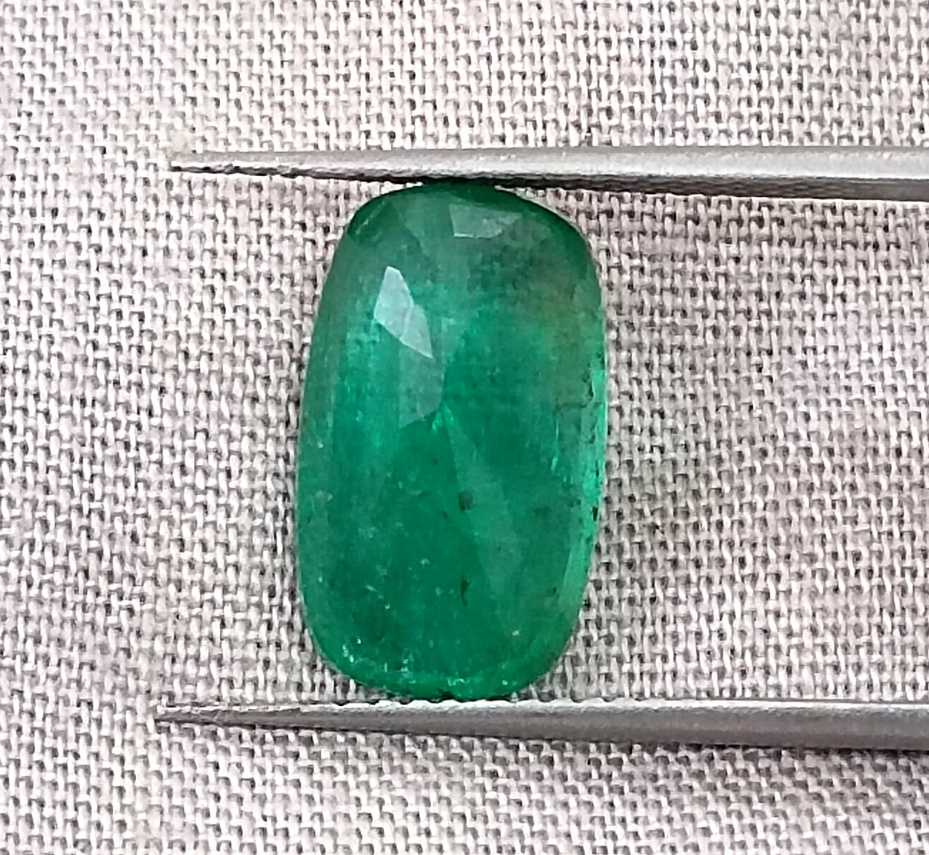 3.99ct deep green colour cushion cut Zambian emerald stone