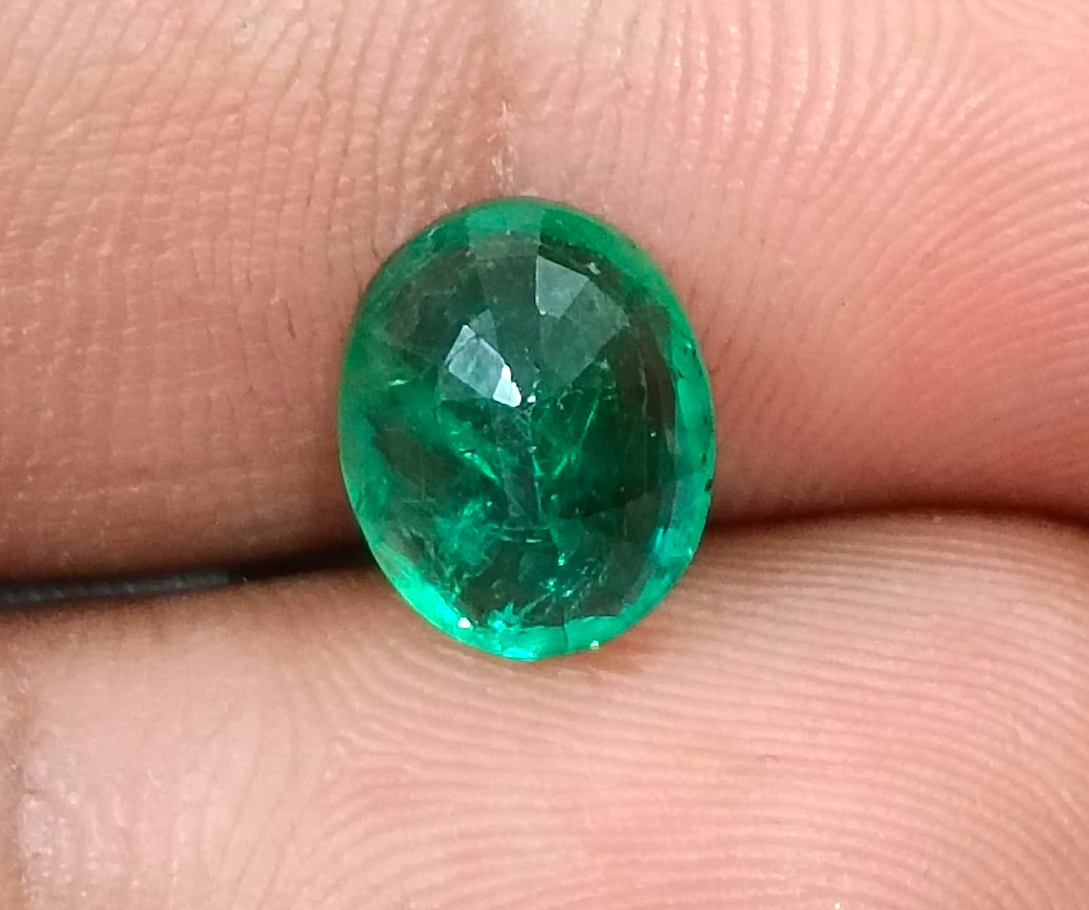 2.40ct Neon green oval cut natural certified Zambian emerald