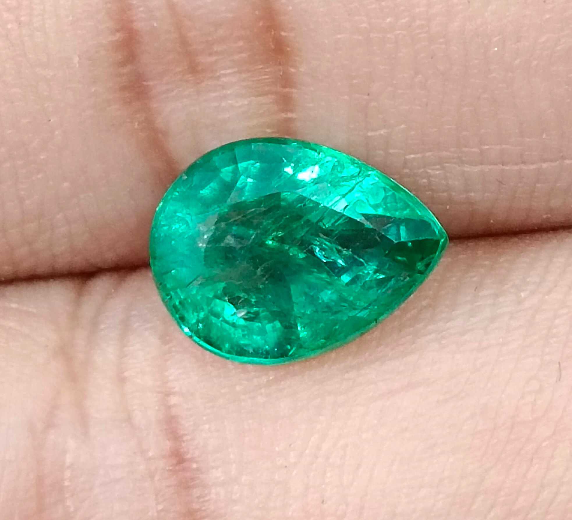 3.19ct GSI certified top shine bright spring green pear cut Zambian emerald 