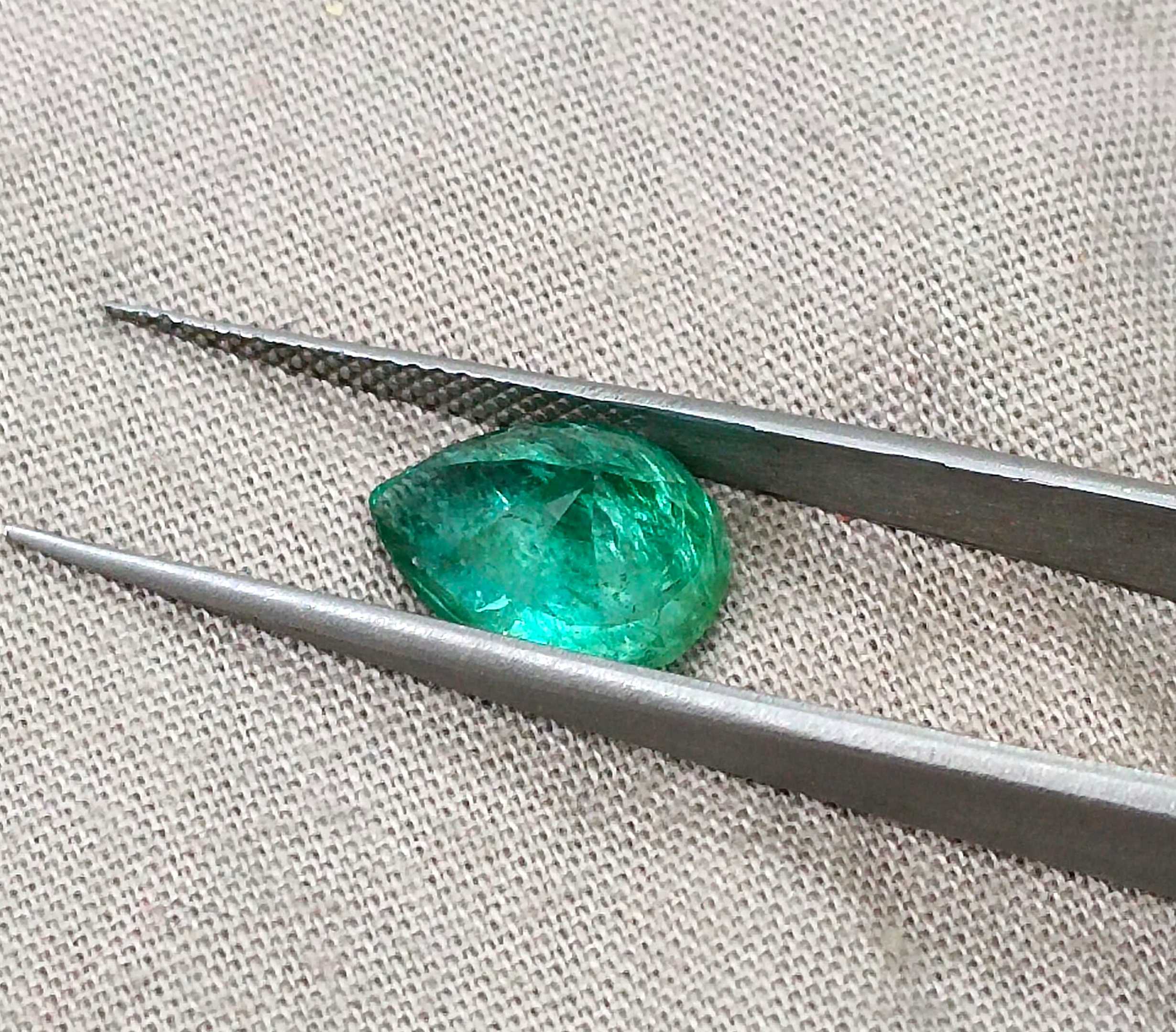 3.19ct GSI certified top shine bright spring green pear cut Zambian emerald 