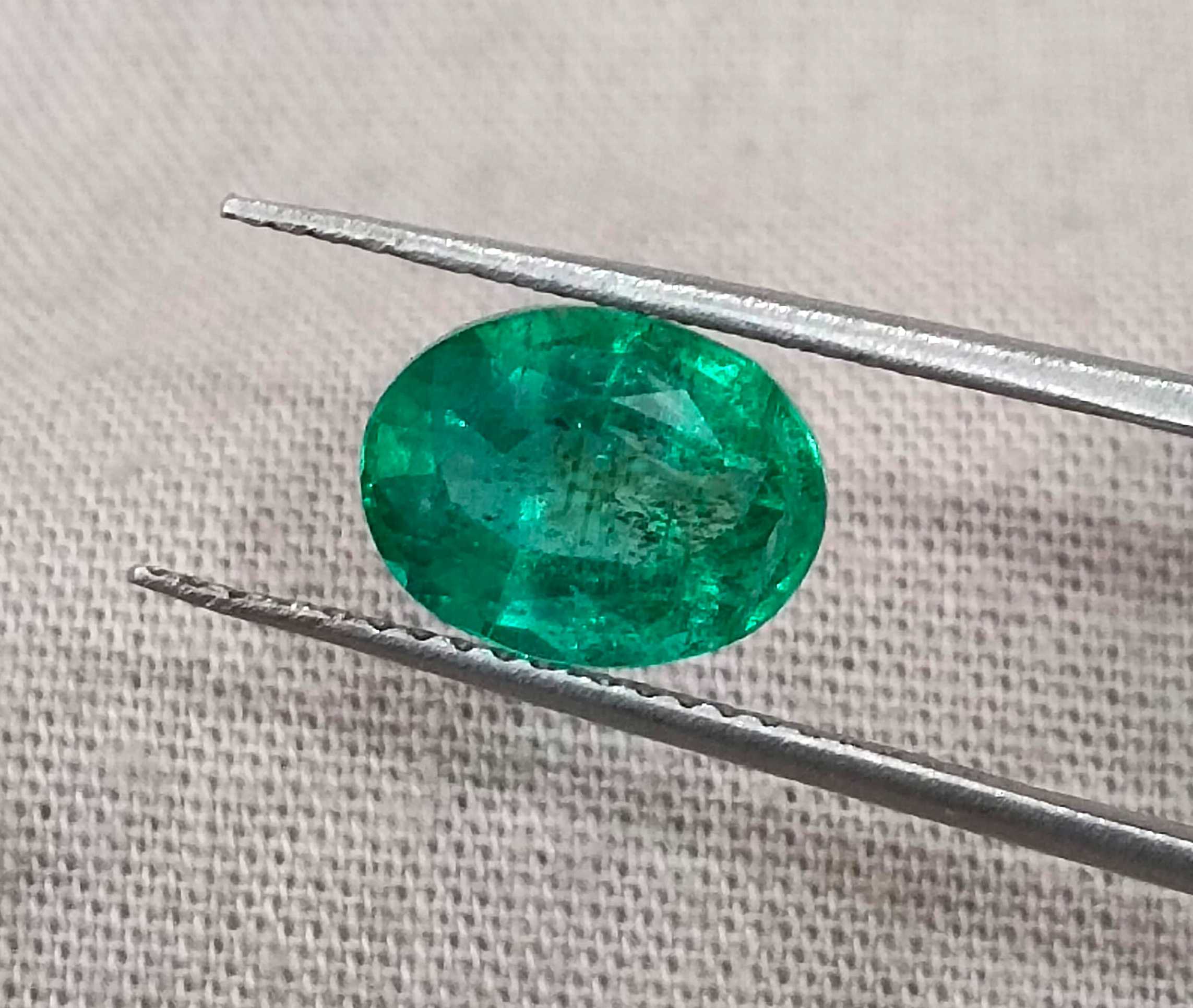 1.92ct GSI USA certified medium deep green oval cut Zambian emerald stone